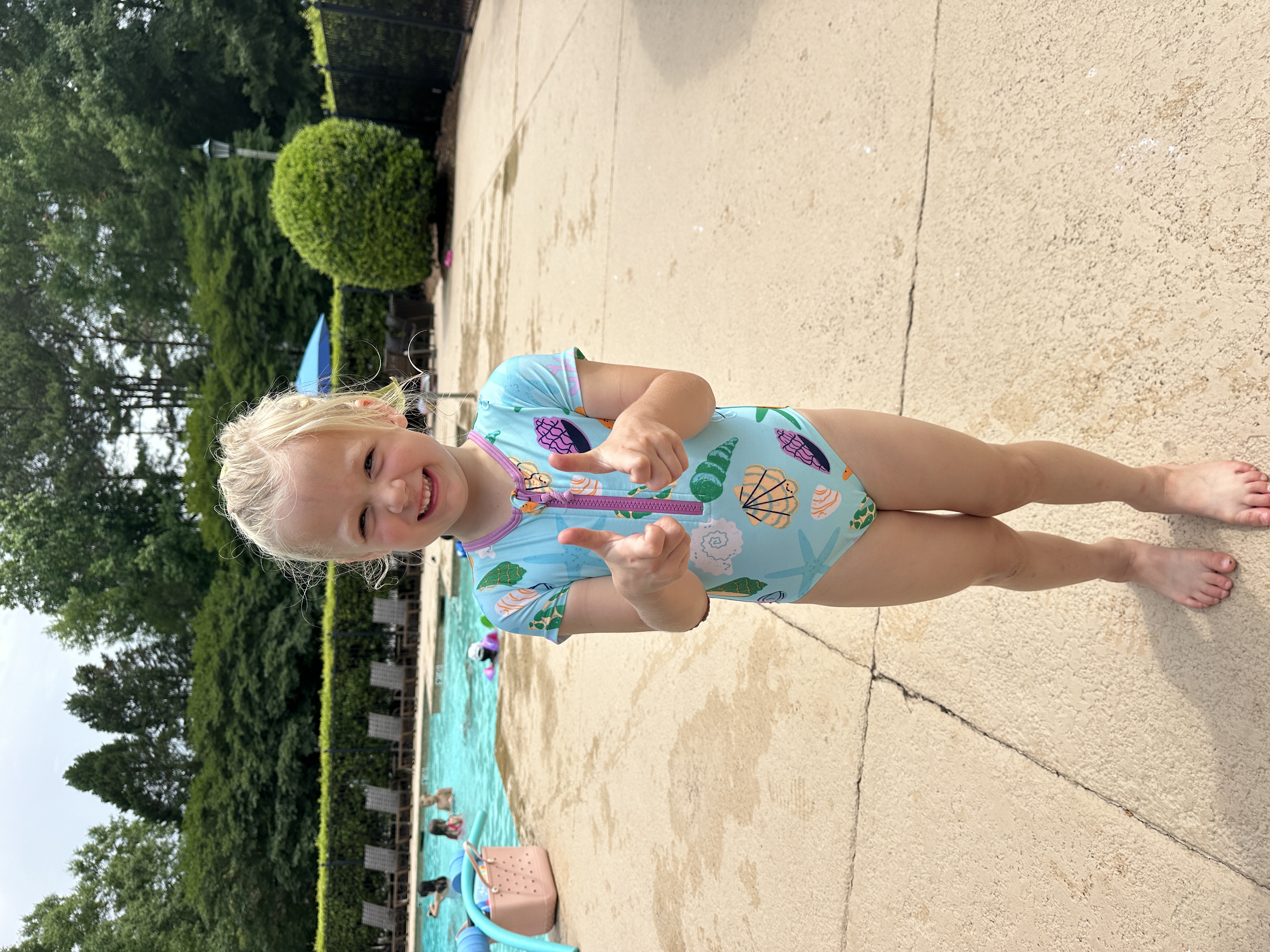 Happy child at poolside