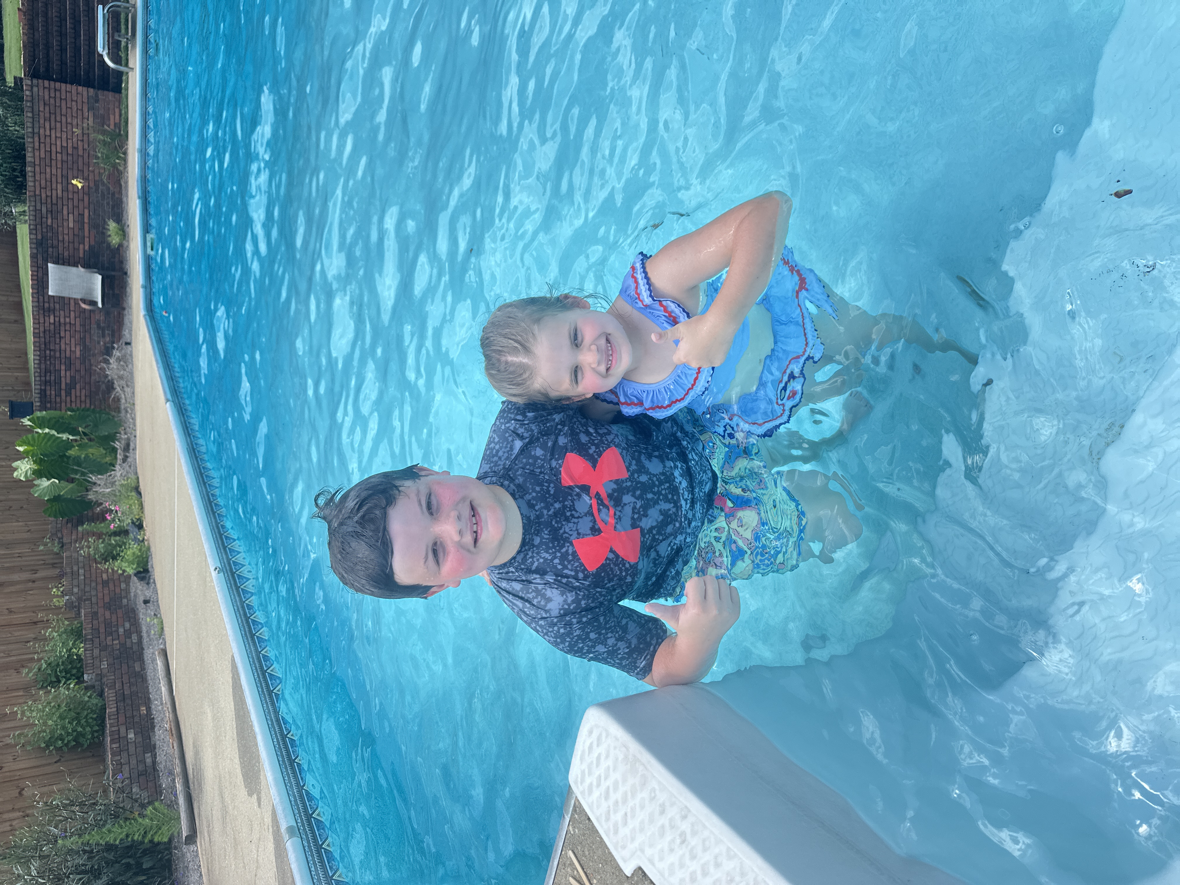 Students in the pool together
