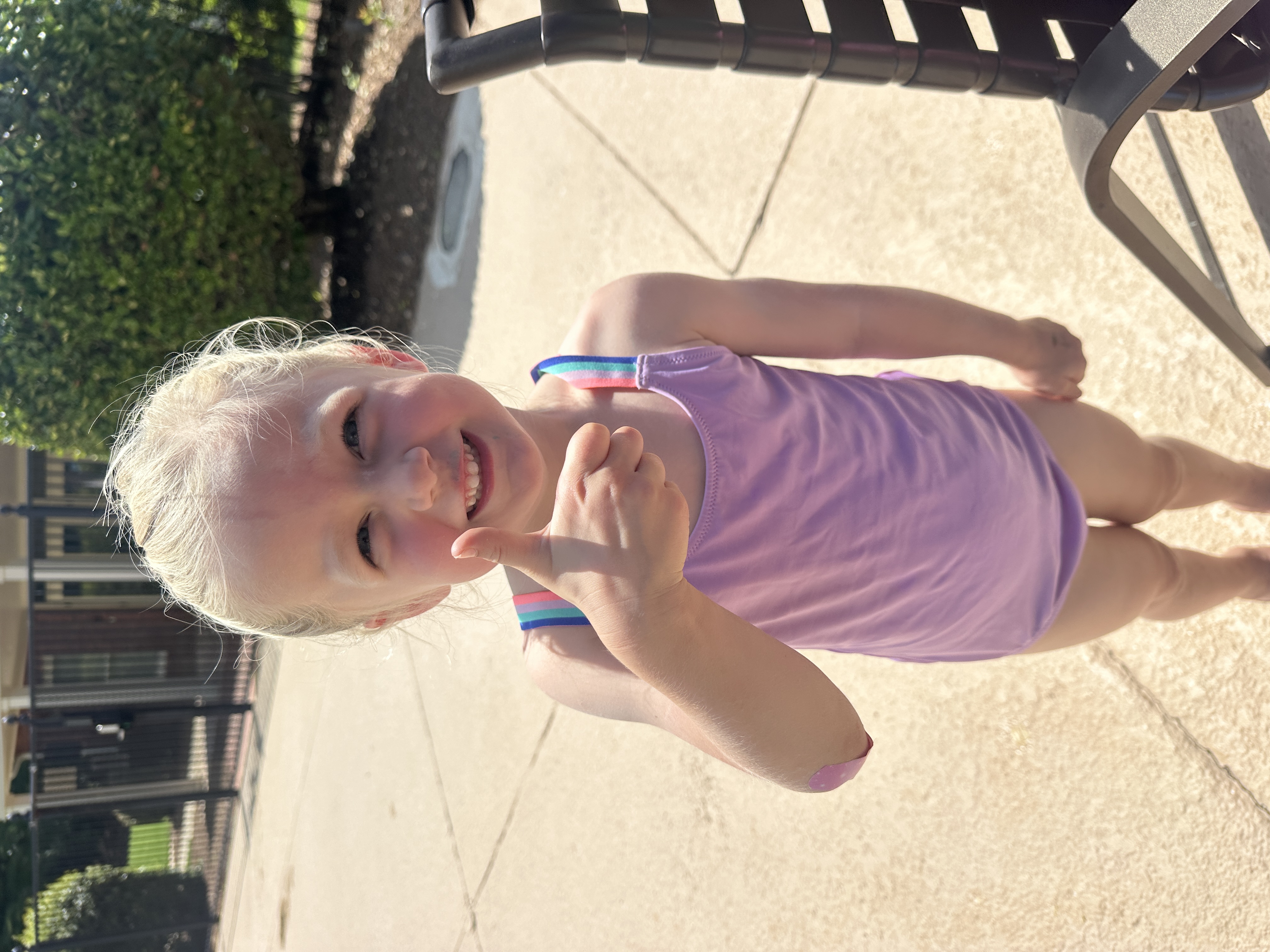 Smiling swimmer in purple