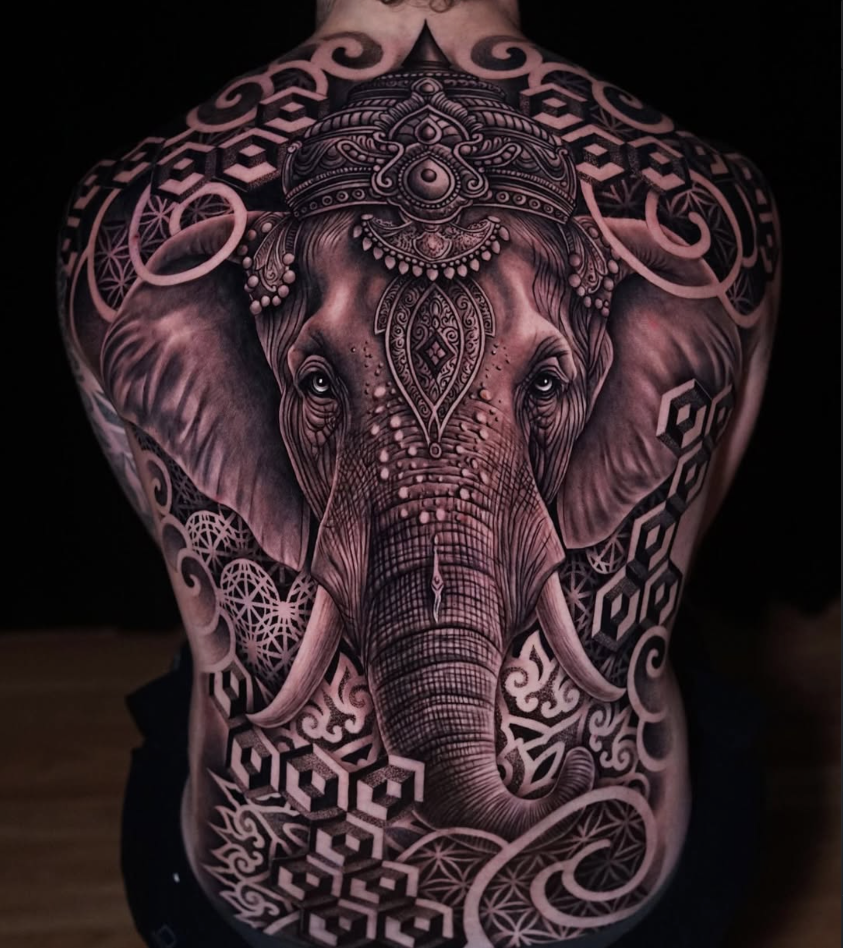 Large elephant back-piece tattoo by a Love Gun artist
