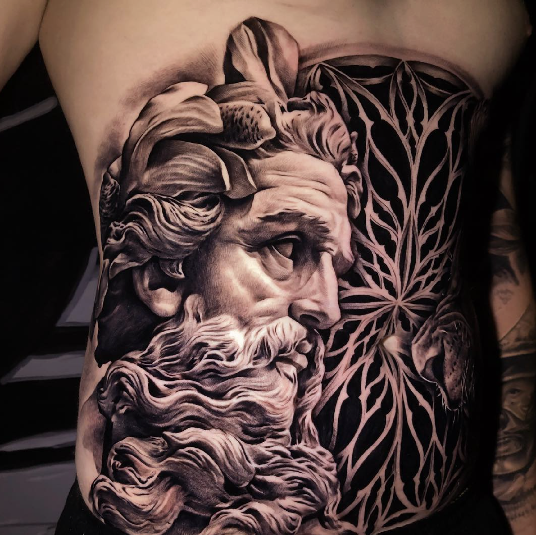 Tattoo shown with a demo client review