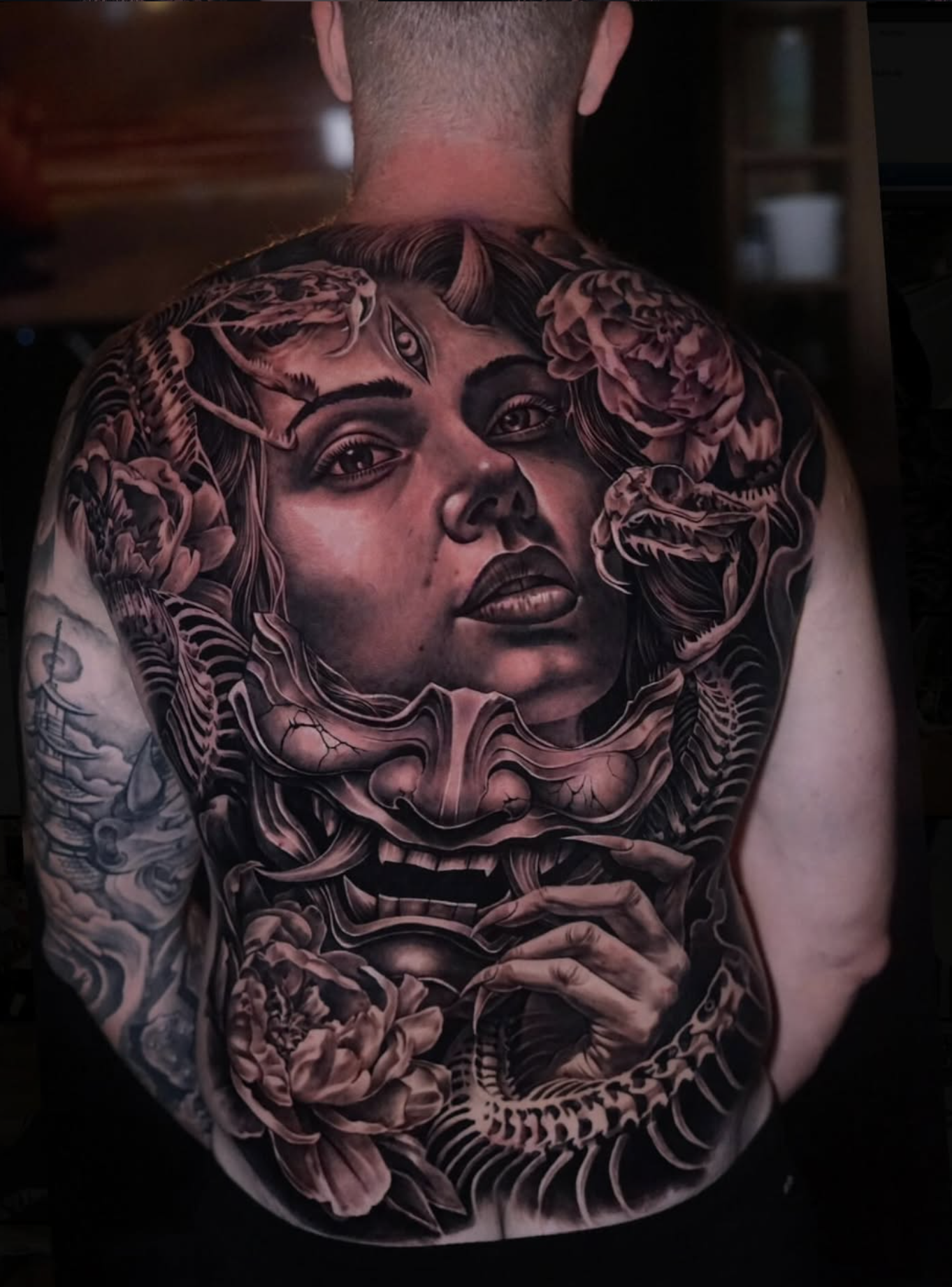 Tattoo shown with a demo client review