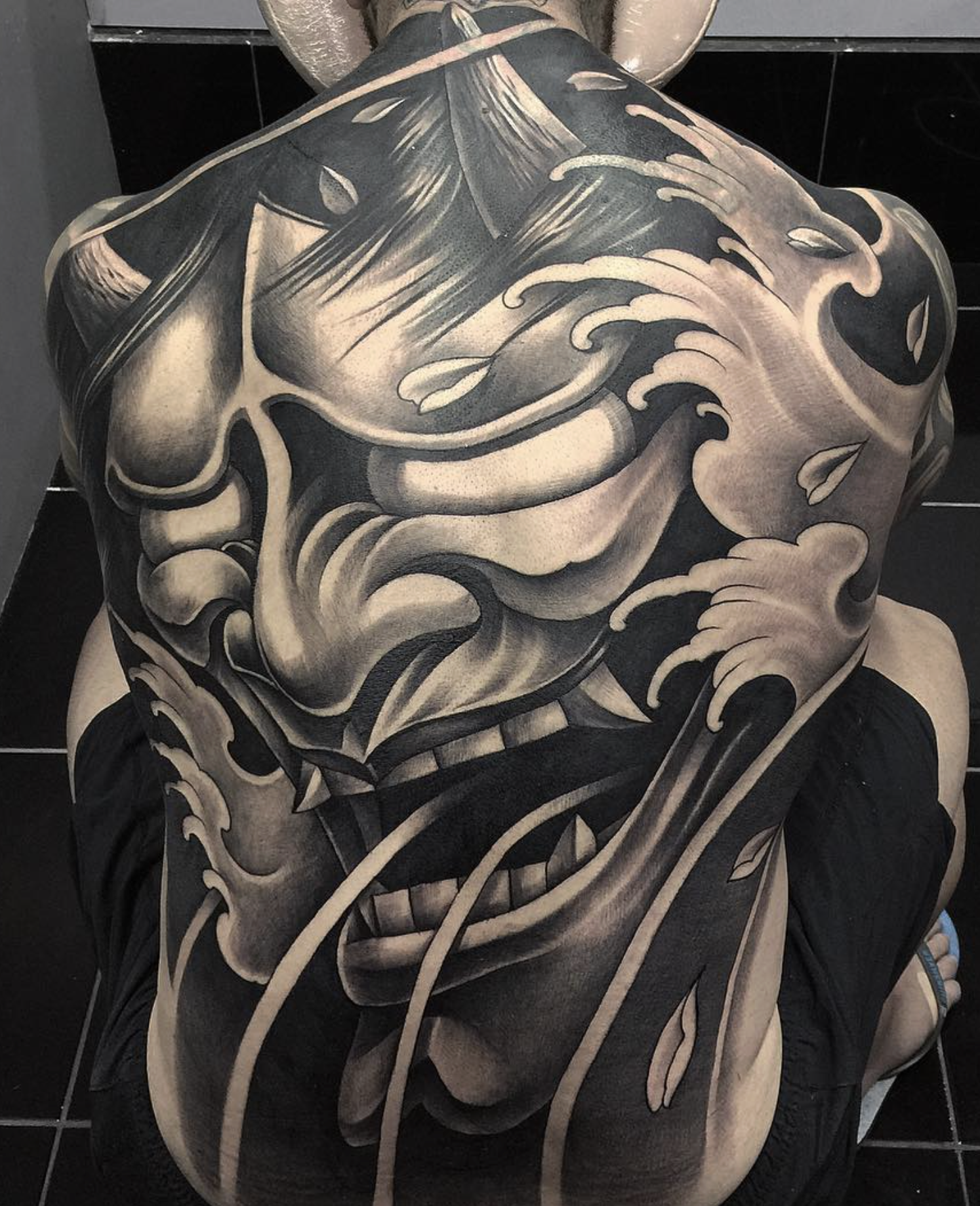 Black and grey tattoo work by a Love Gun artist