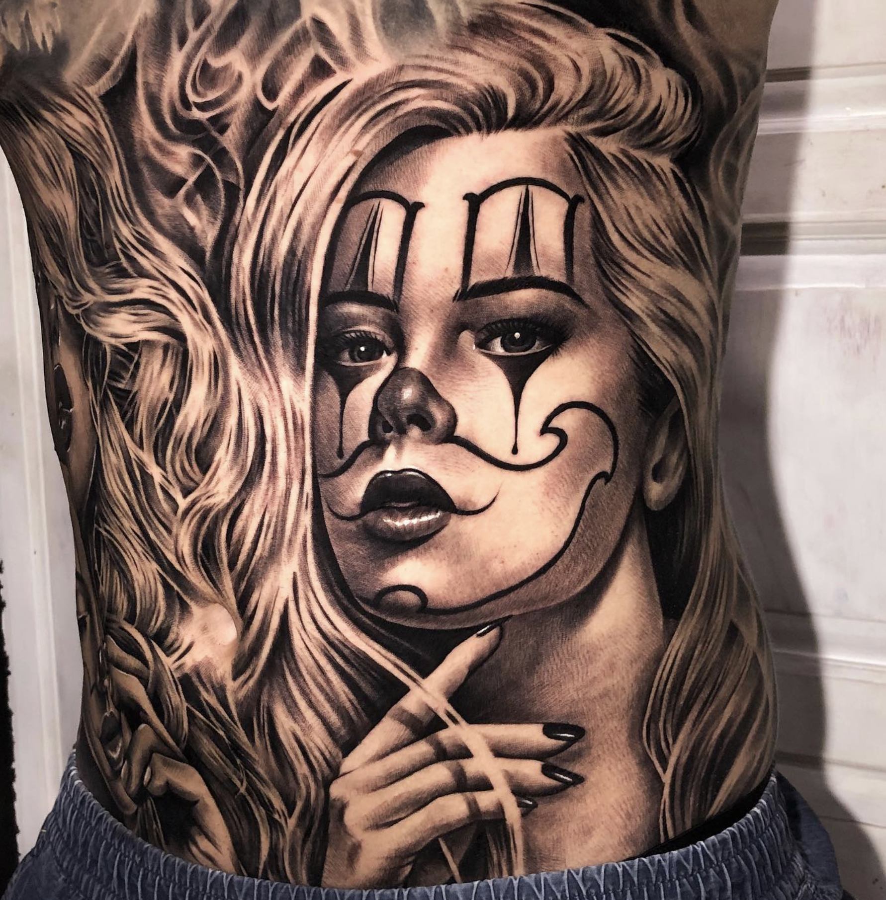 Detailed tattoo work by a Love Gun artist