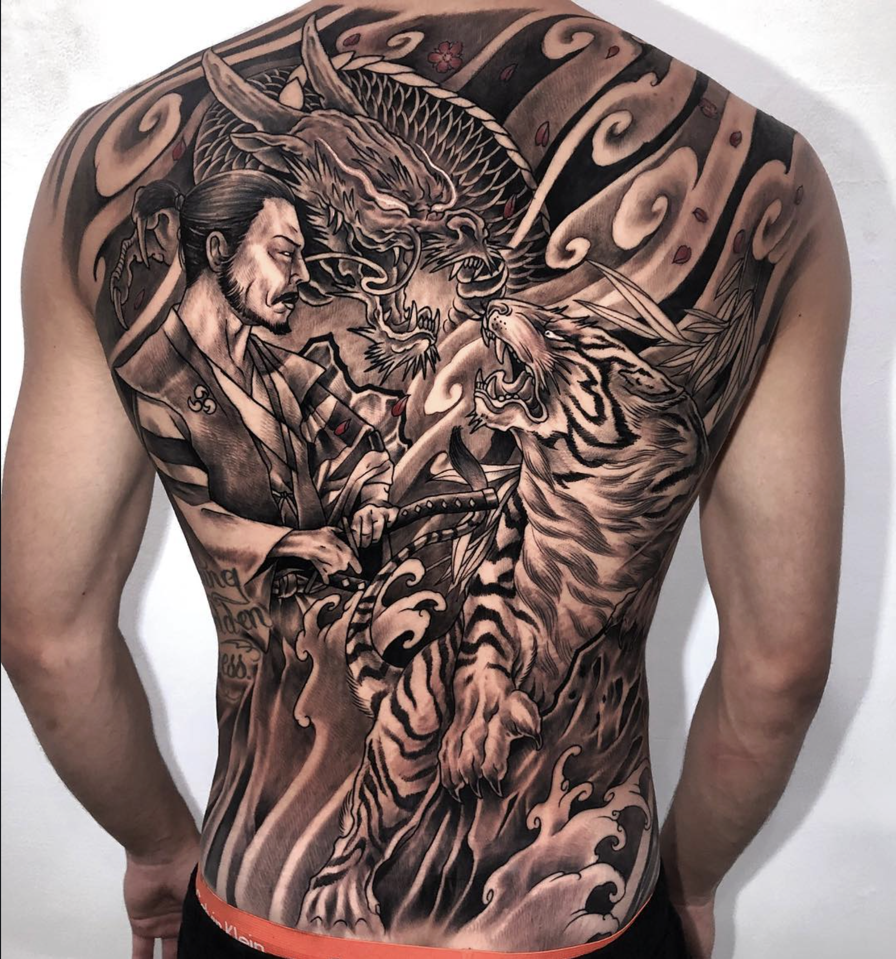 Realism tattoo work by a Love Gun artist