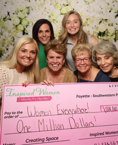 Chapter leaders of the Inspired Women Network celebrating one million dollars raised