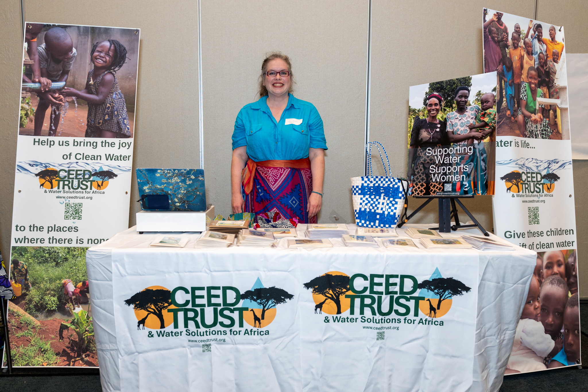 A nonprofit representative sharing their work with an Inspired Women chapter in Pittsburgh