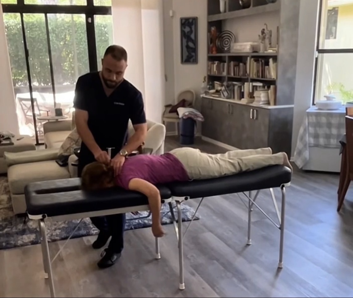 Gentle chiropractic adjustment at home
