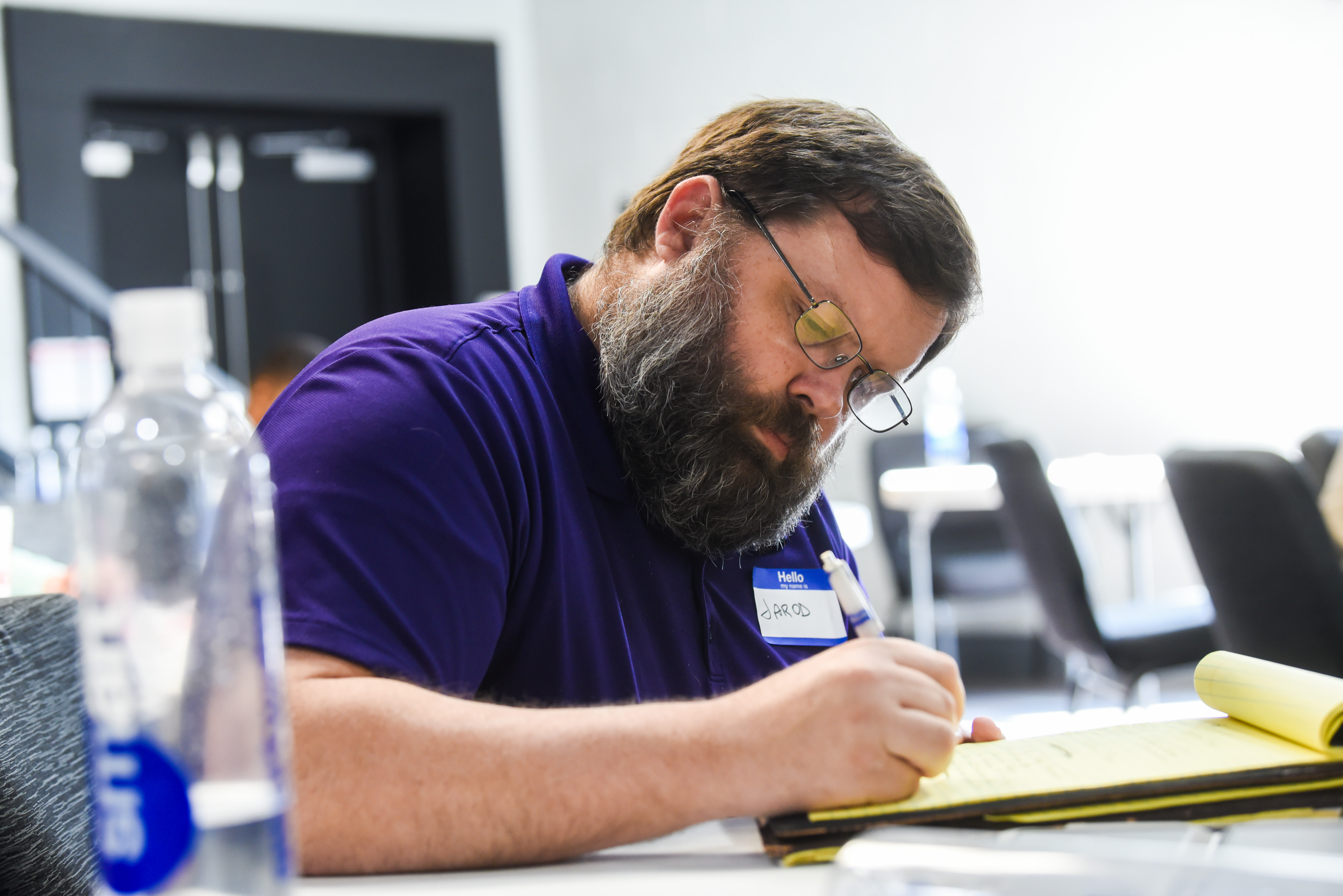 Operator taking notes