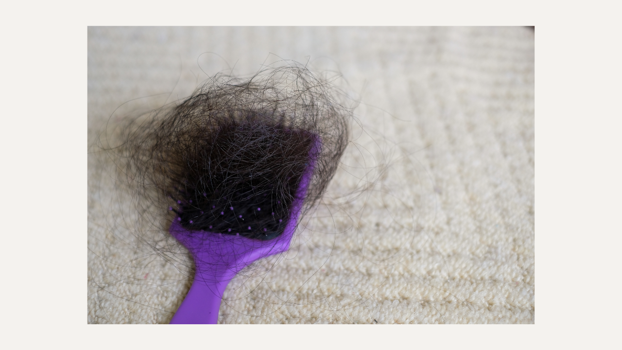 hair in a brush after hair loss in women over 40