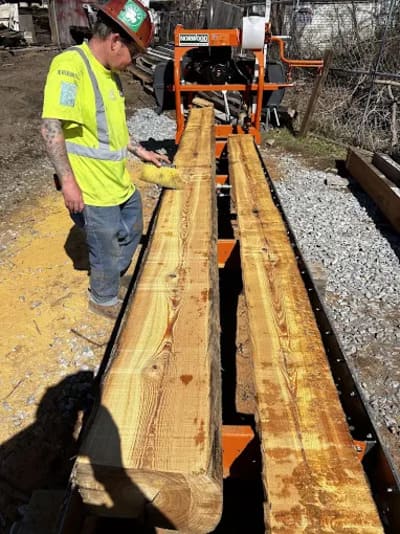Reclaimed beams made into Custom-made flooring in Massachusetts
