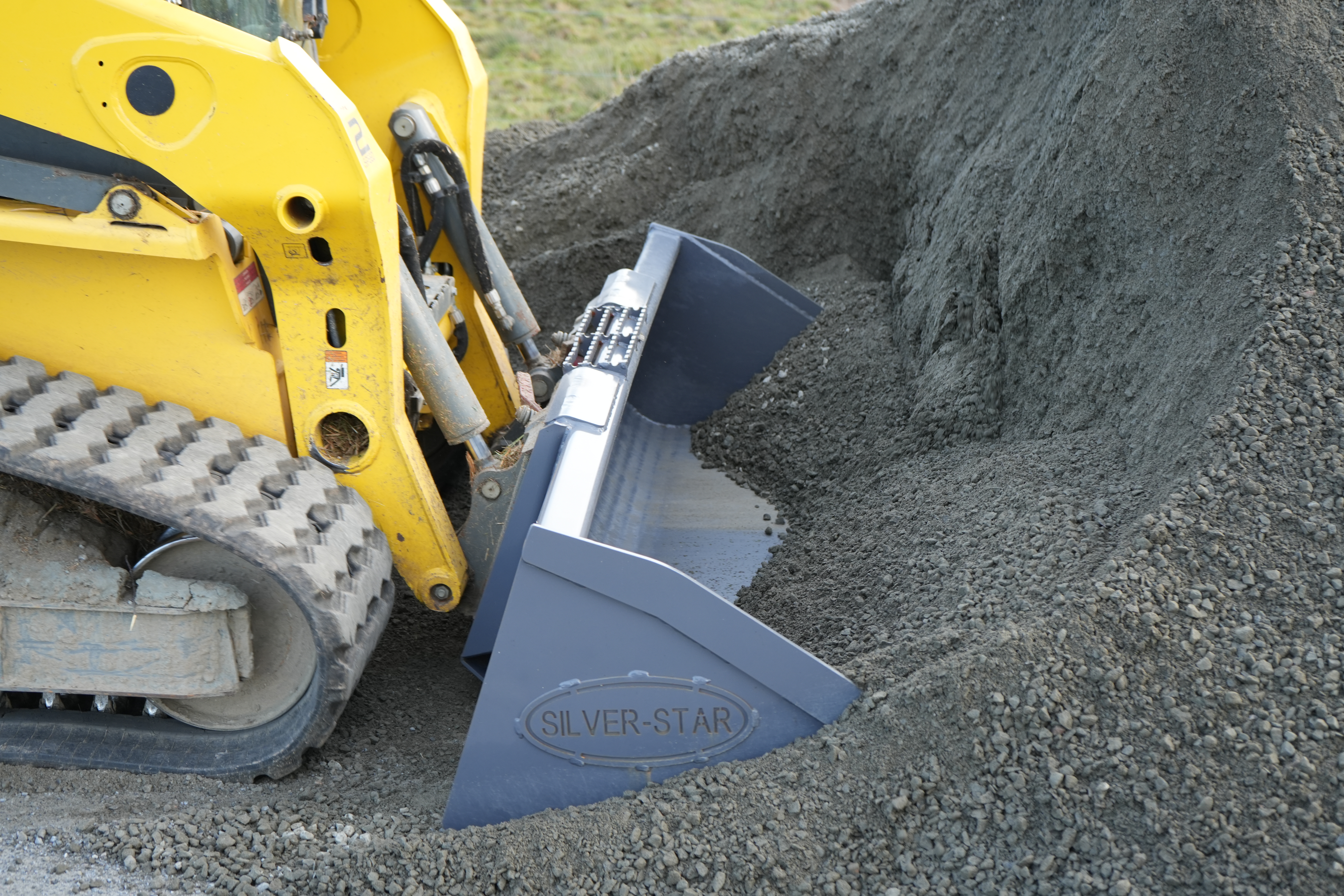 Grader Attachment in Action on Dirt Site Grader Attachment in Action on Dirt Site