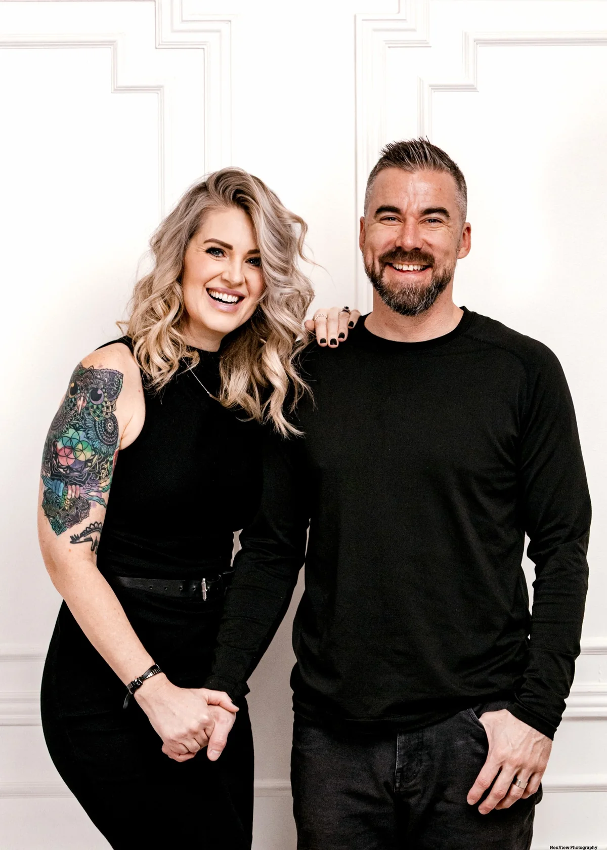 Salt Lake City life coaches Cori and Jake Sartori smiling together
