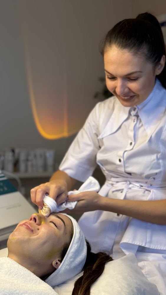 Skin therapist treating a client at Skin Gallery