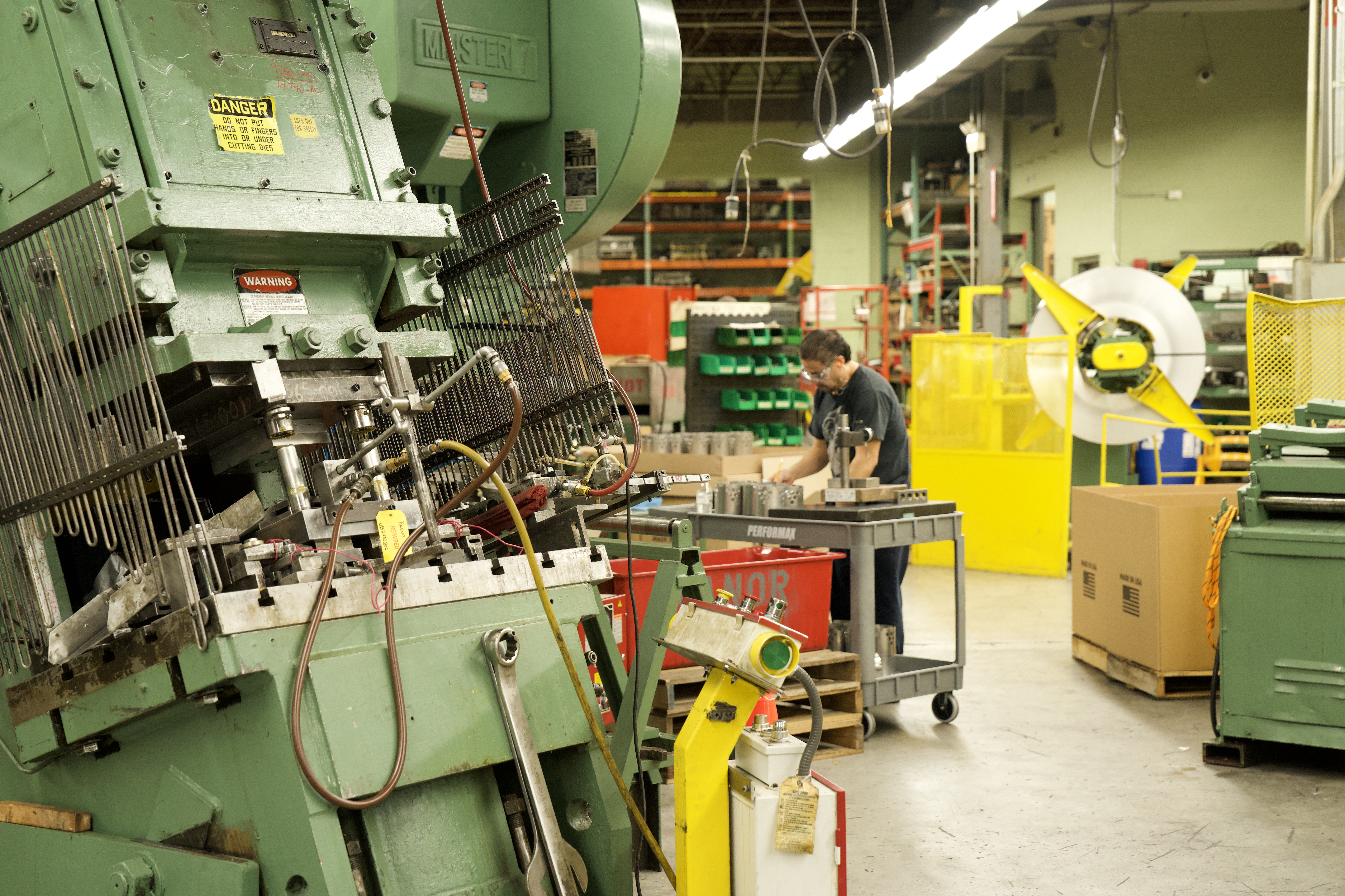 Precision metal stamping press at Manor Tool & Manufacturing
