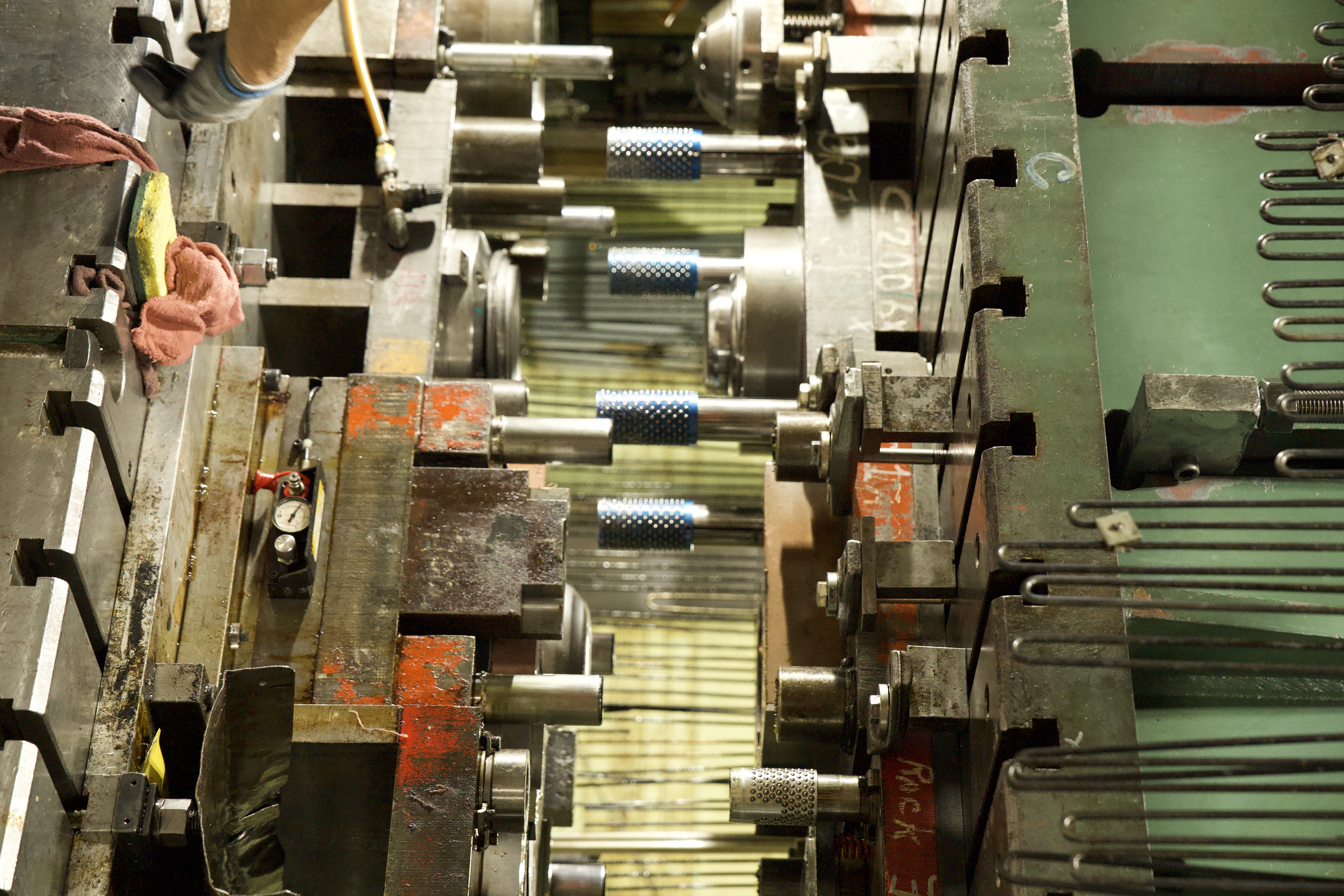 Precision-formed metal stamped parts with tight tolerances