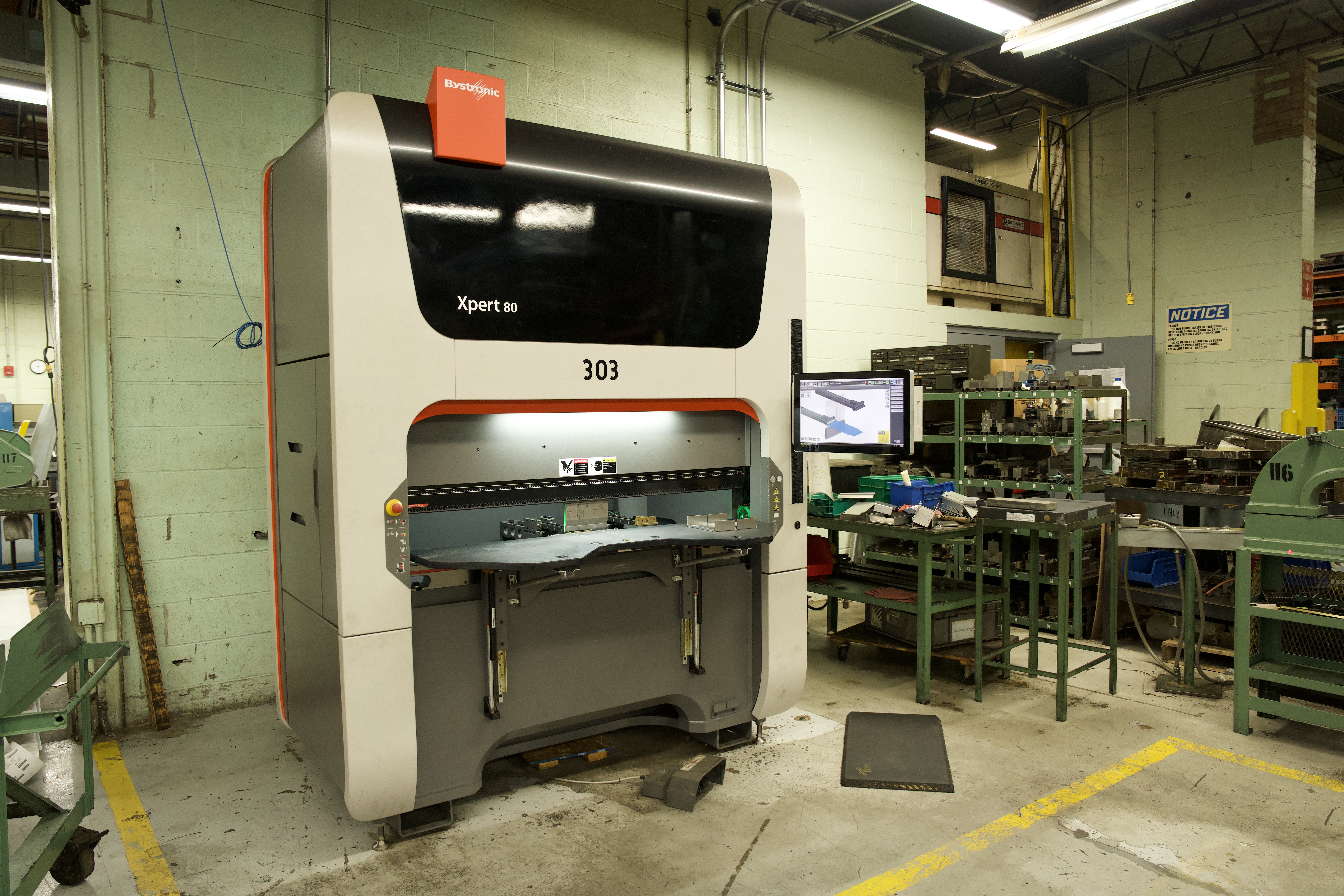 CNC press brake on the fabrication floor at Manor Tool