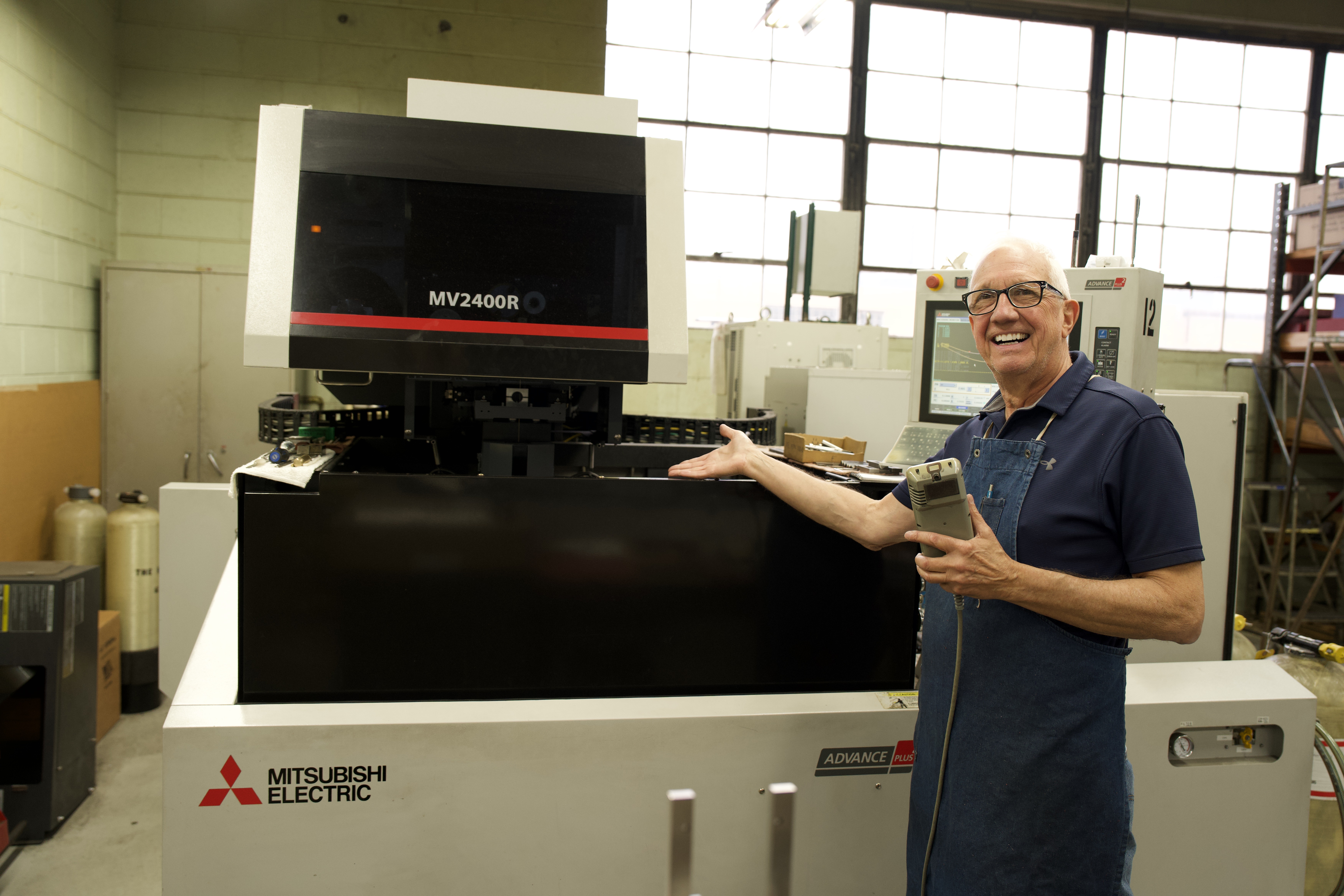 Manor Tool team member at a fabrication machine — Schiller Park, IL
