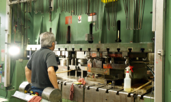 Progressive die stamping in operation