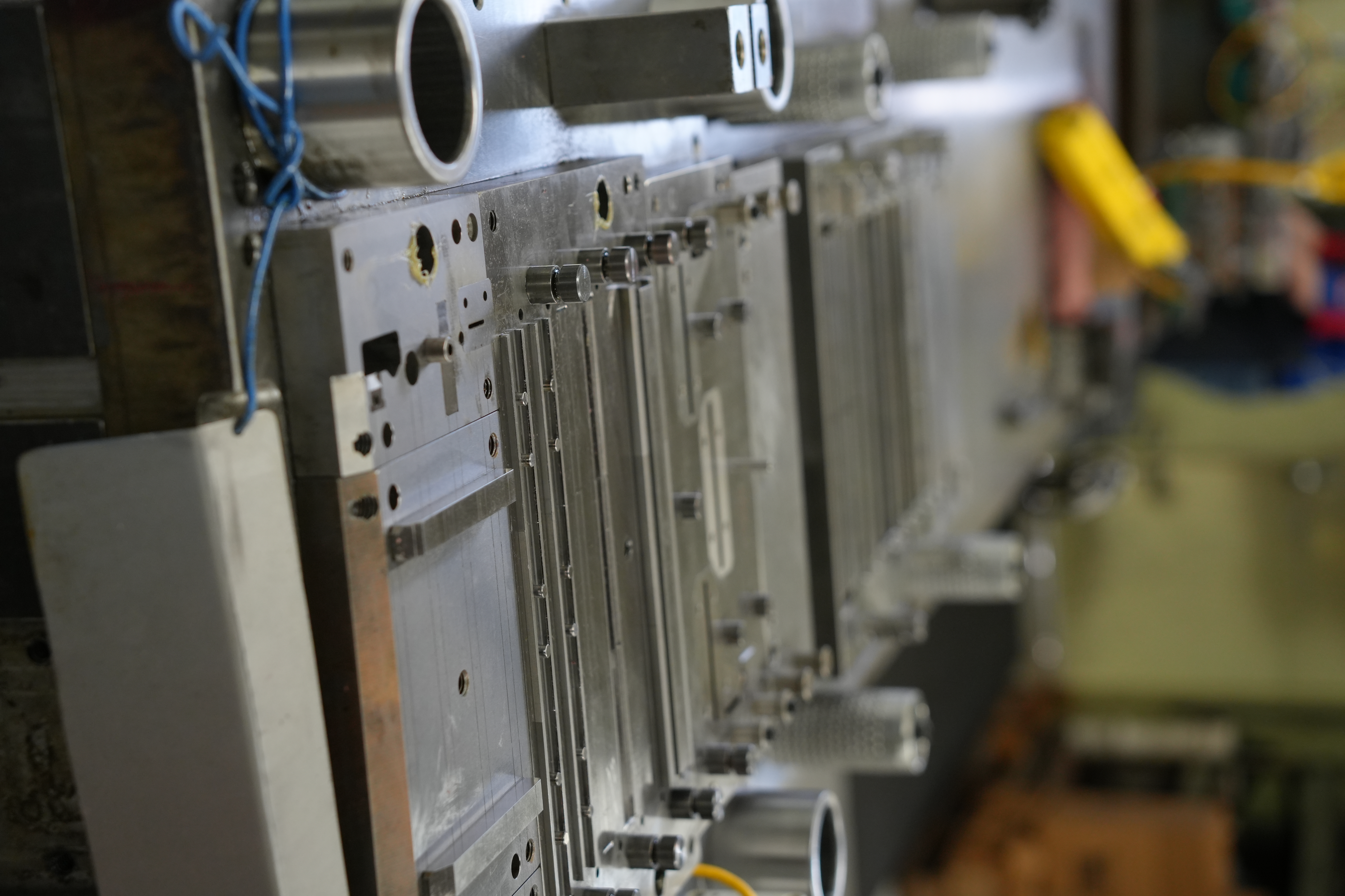 Progressive die stations with built-in quality features