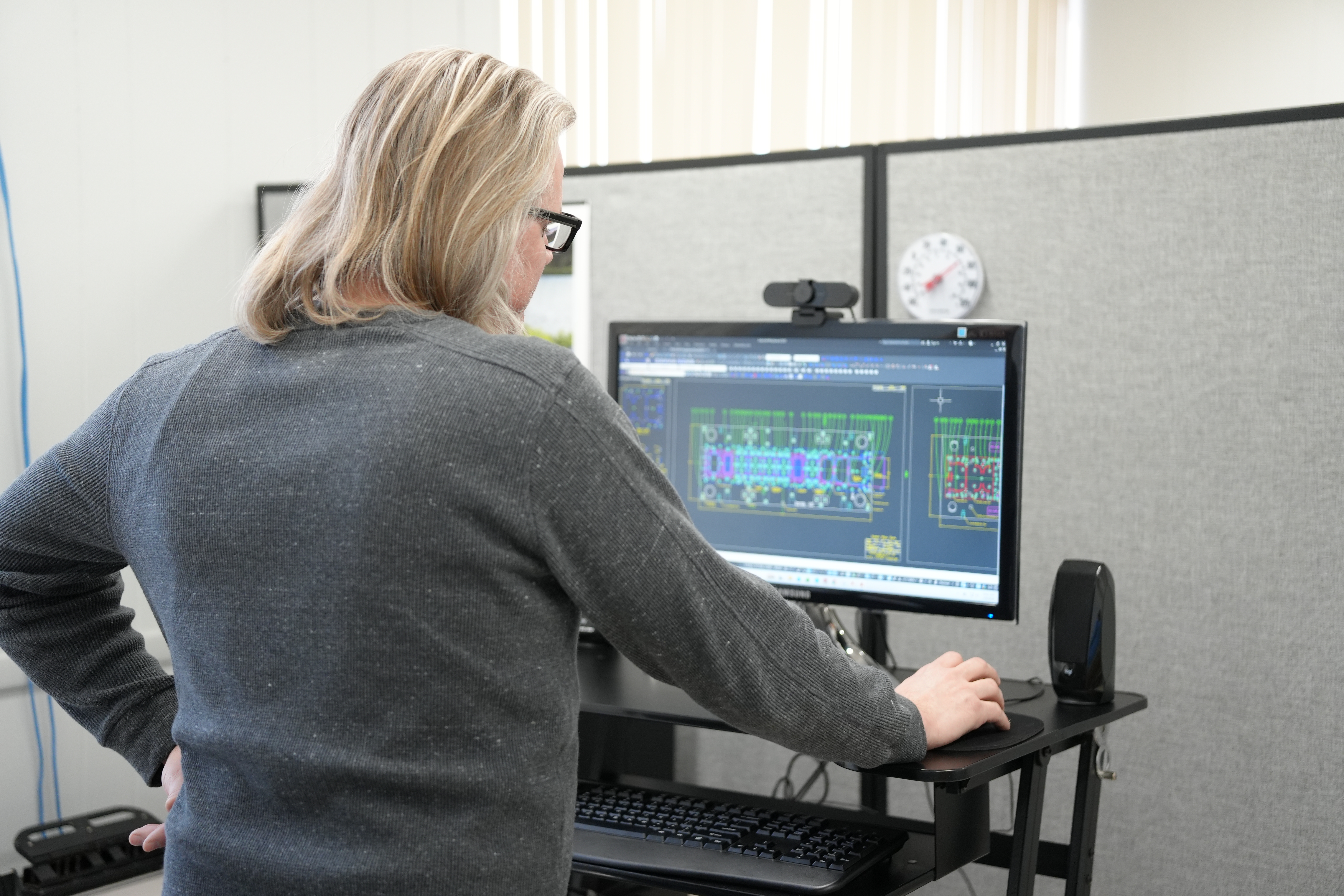 Manor Tool engineer designing tooling at a CAD workstation — Schiller Park, IL