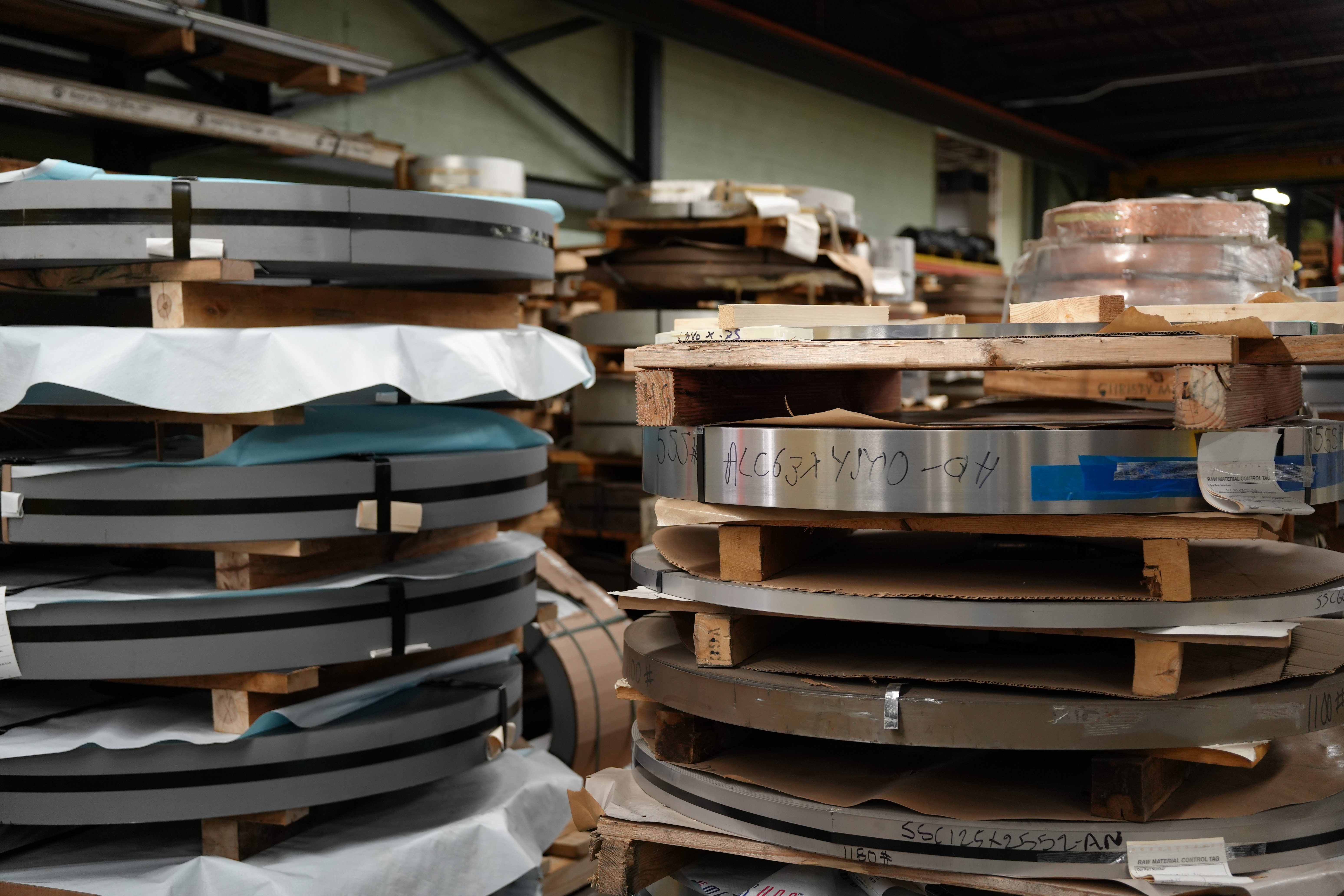 Sheet metal stock staged for stamping at Manor Tool