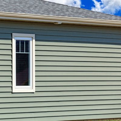 Newly installed vinyl siding on a house