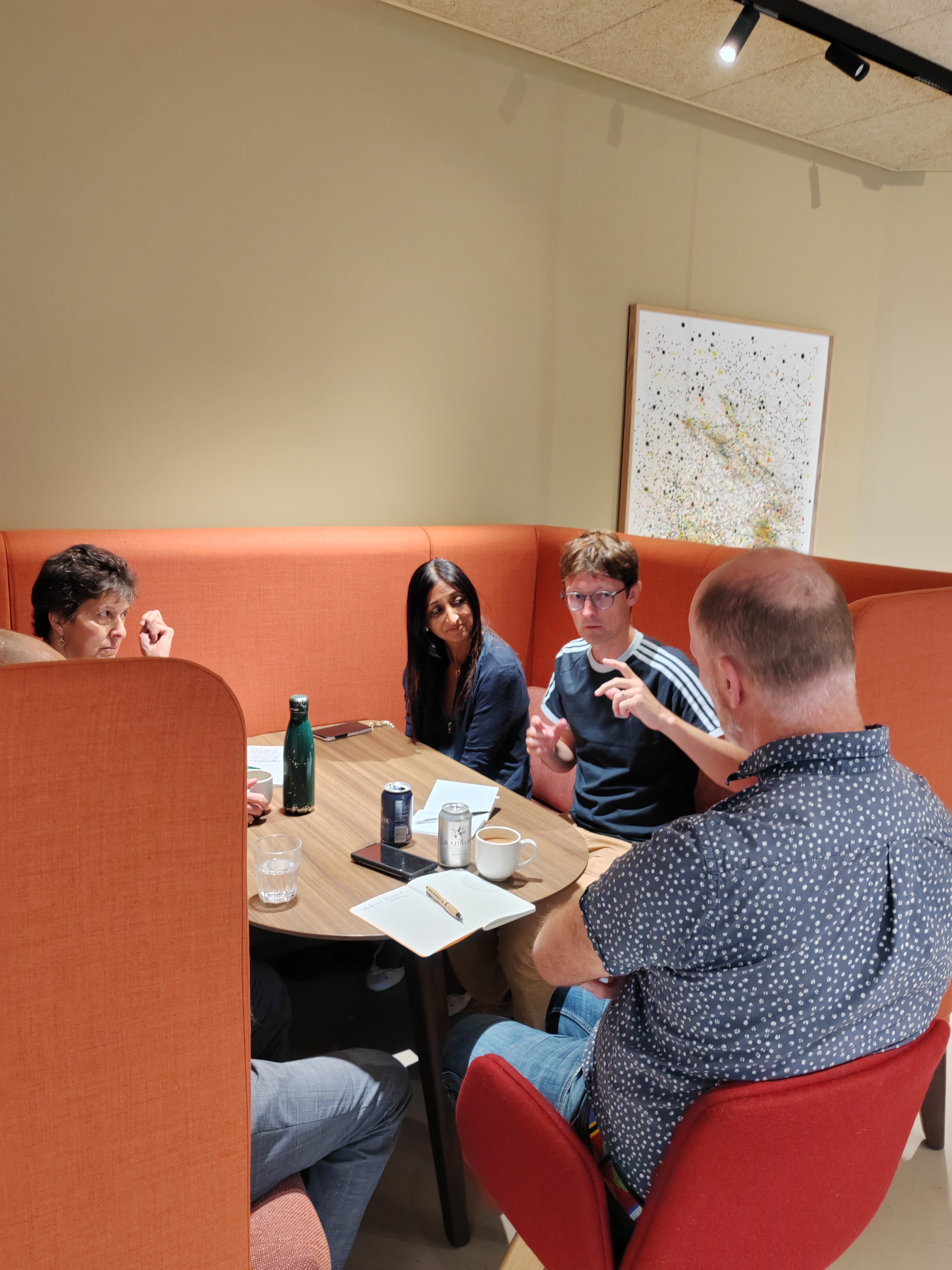 Small group conversation at an A Better Way Of Life London event