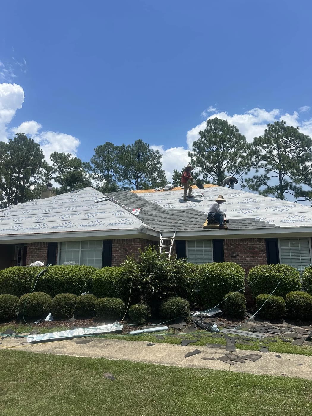 C.F. Life crew installing a new shingle roof