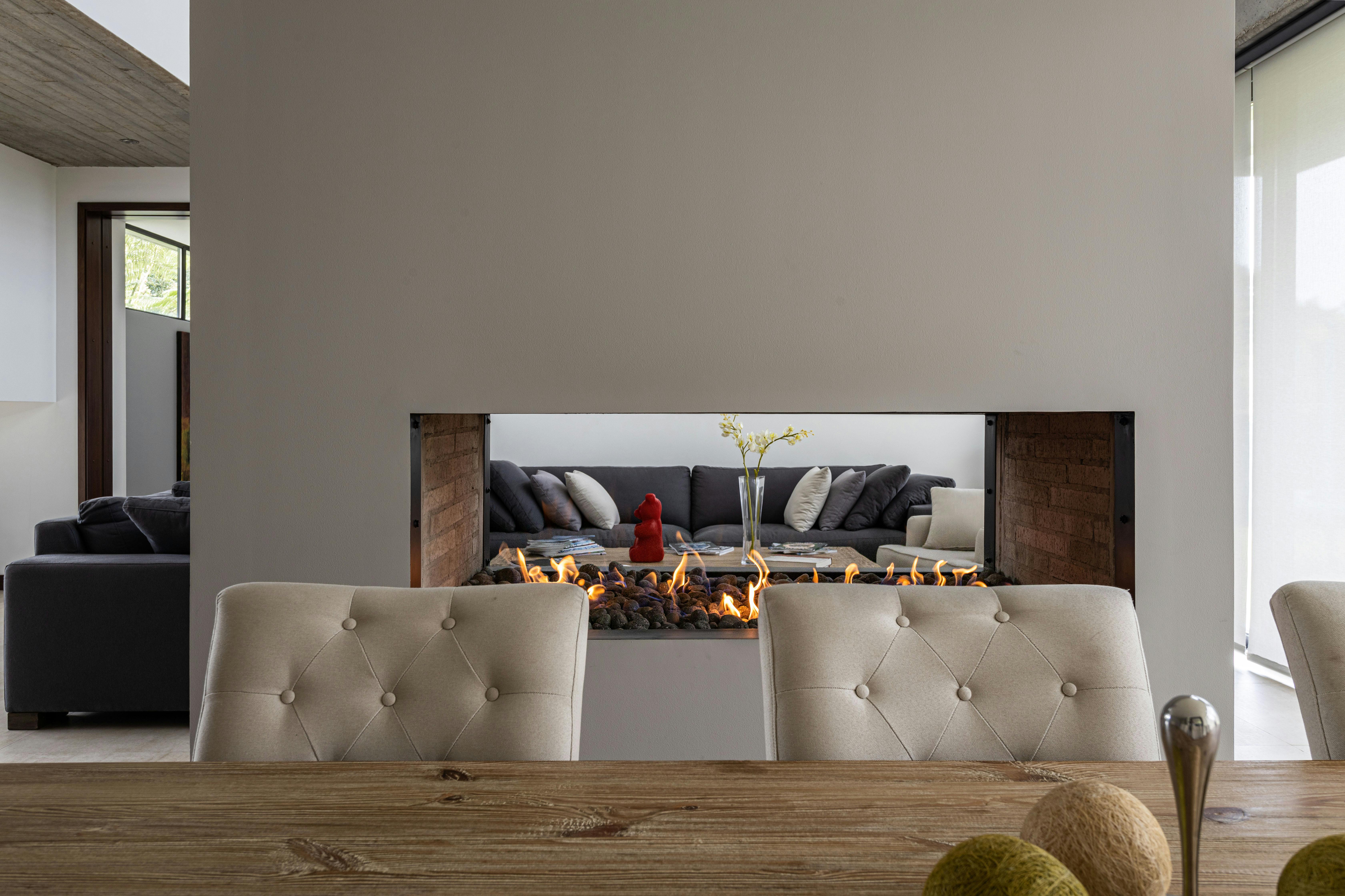 Modern linear gas fireplace with contemporary surround