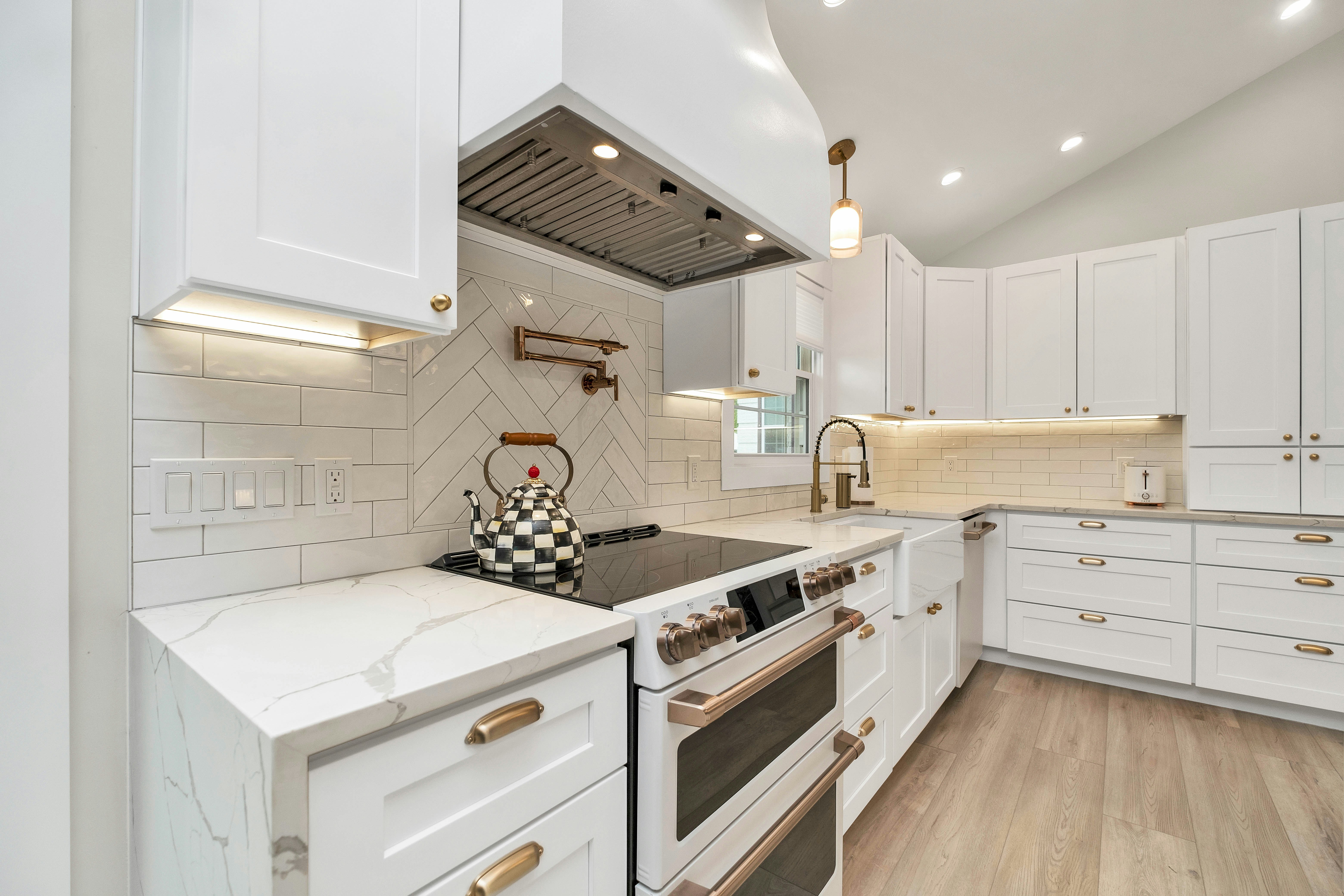 Painted kitchen cabinets with white finish