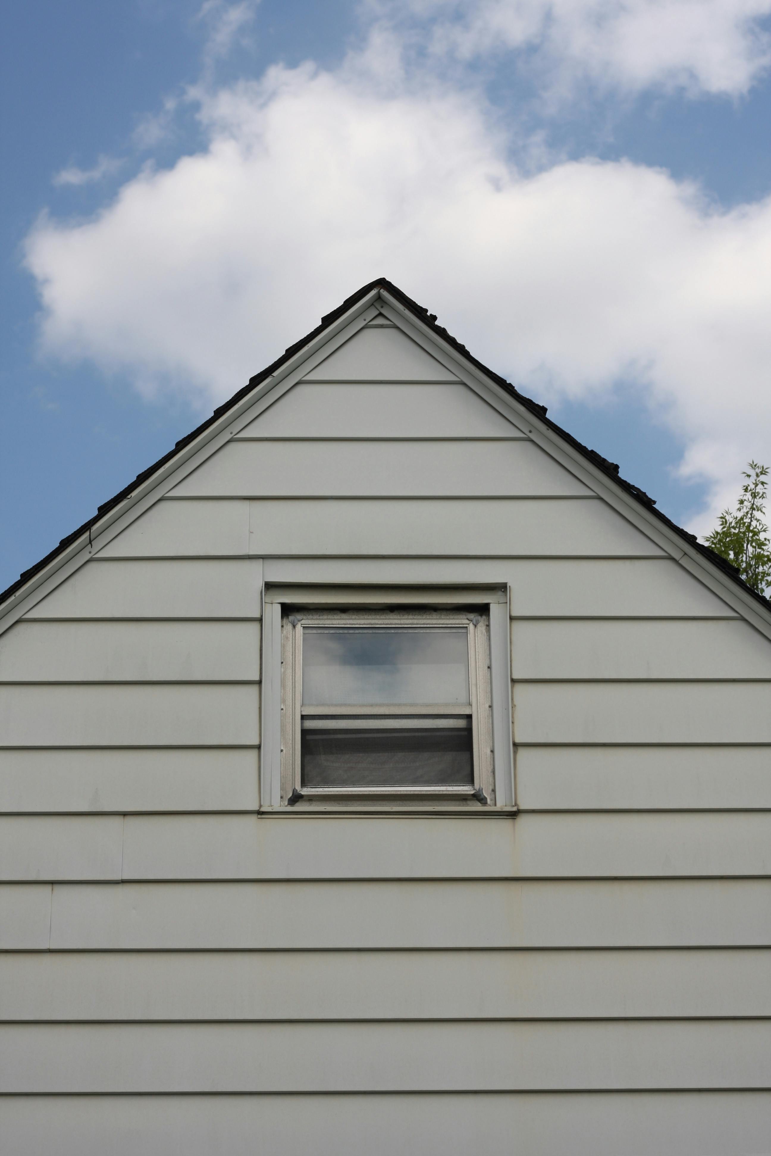 Traditional cedar wood siding on a Cleveland century home