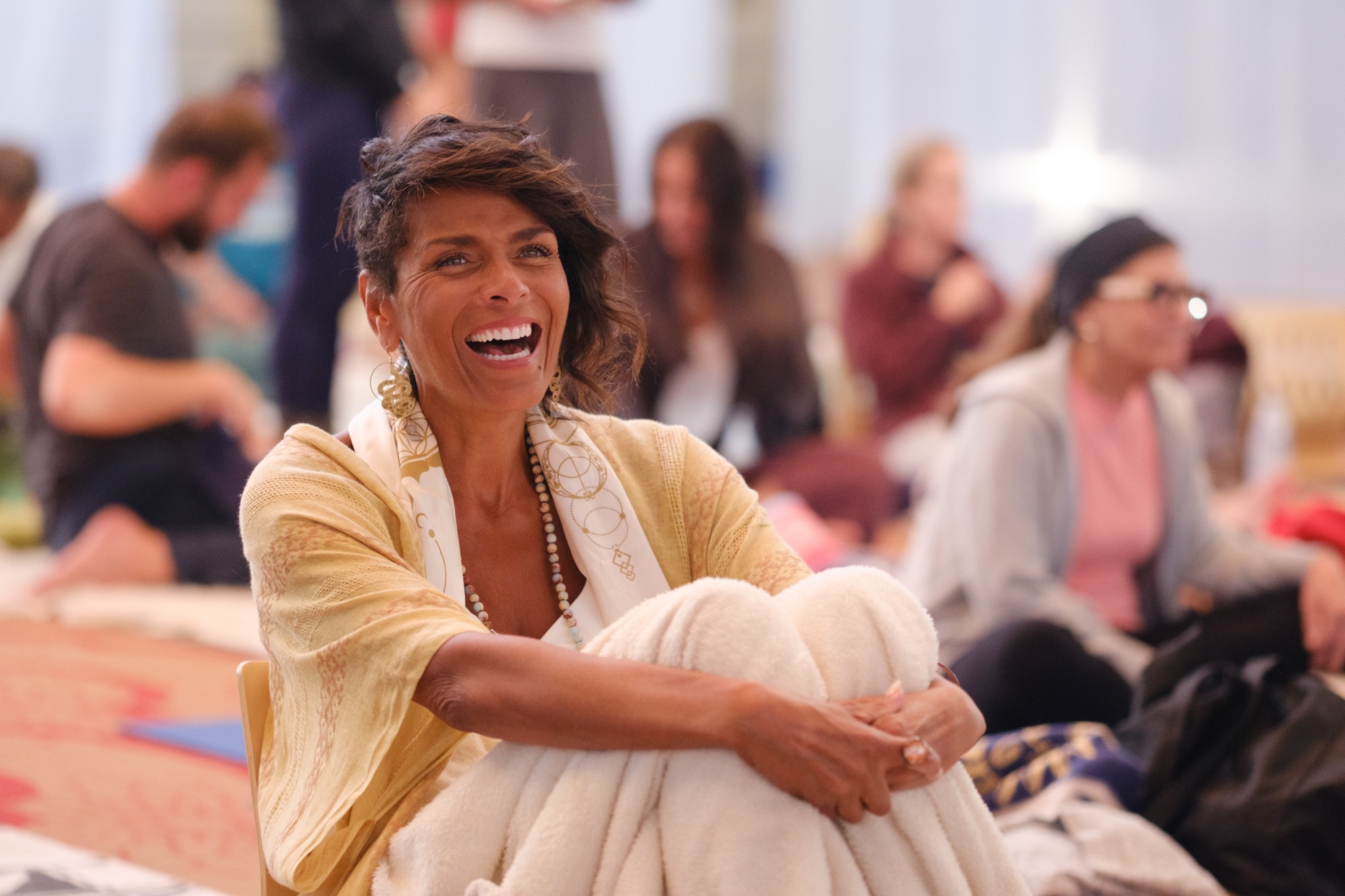Darieth Chisolm smiling in The Gathering Room