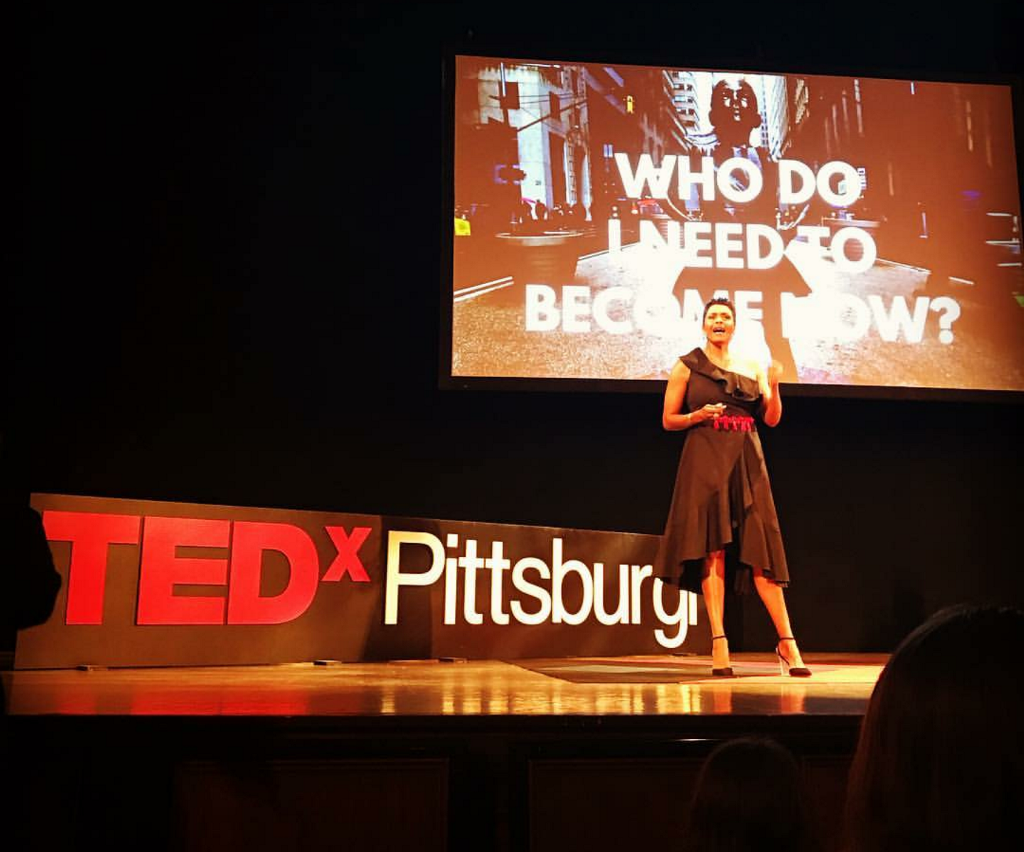 Darieth Chisolm presenting on the TEDx Pittsburgh stage