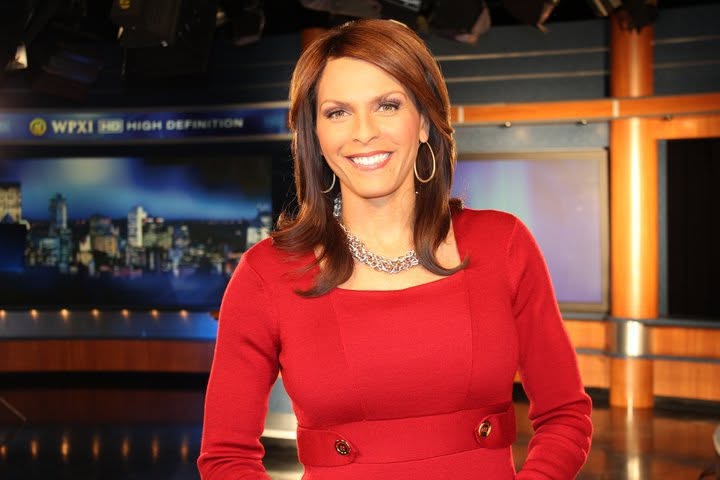 Darieth Chisolm on a television news set