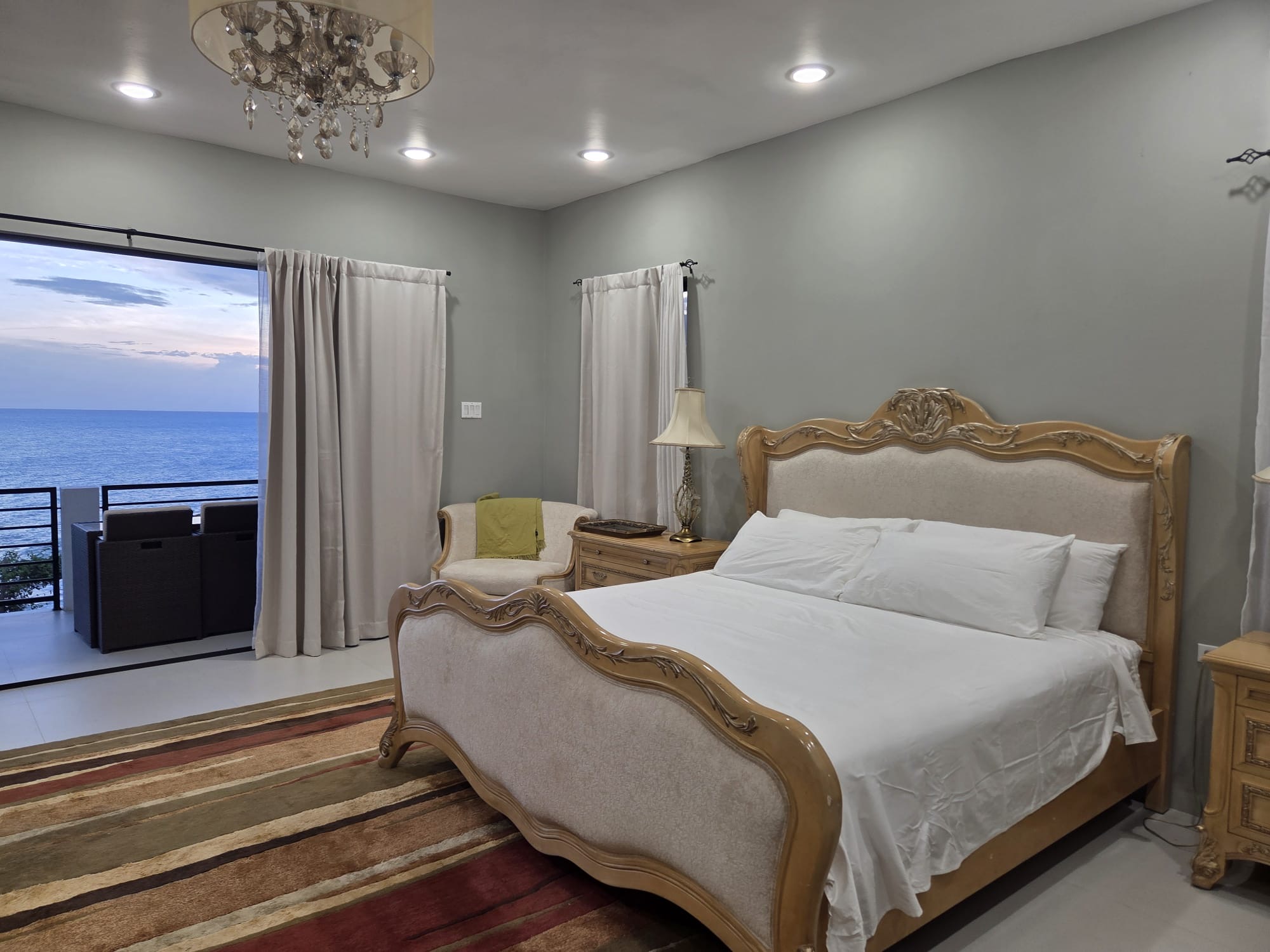 Ocean-view queen bedroom