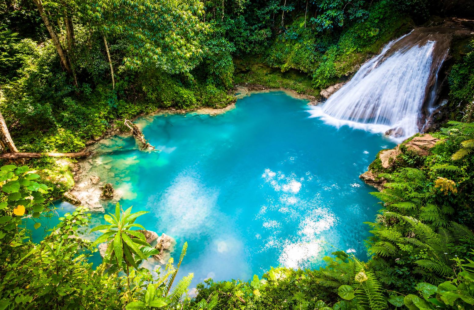 Turquoise waterfall and lagoon in Jamaica