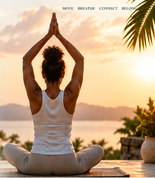 Woman seated in yoga with her arms raised