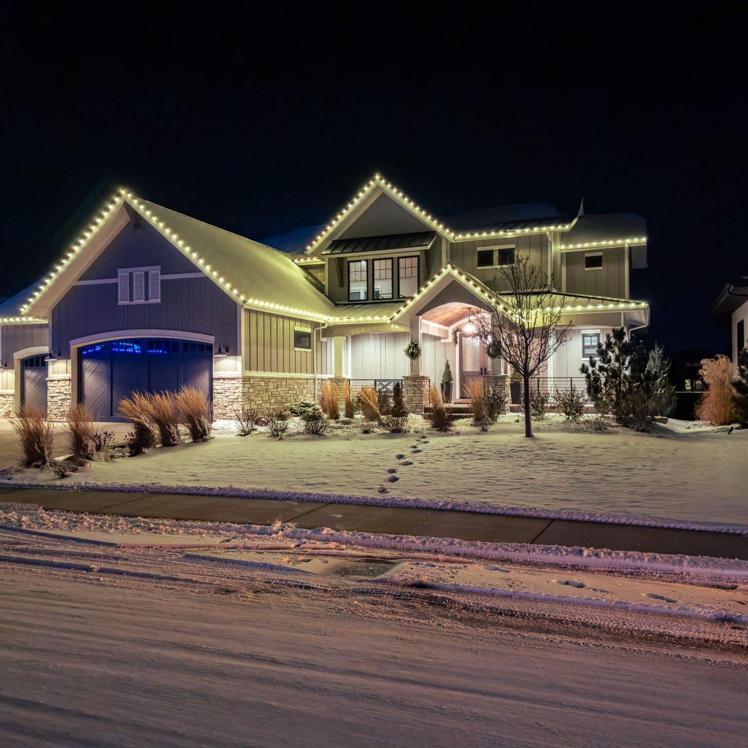 Warm white Christmas light installation in Fort Collins using premium commercial-grade C9 bulbs for cozy holiday home lighting