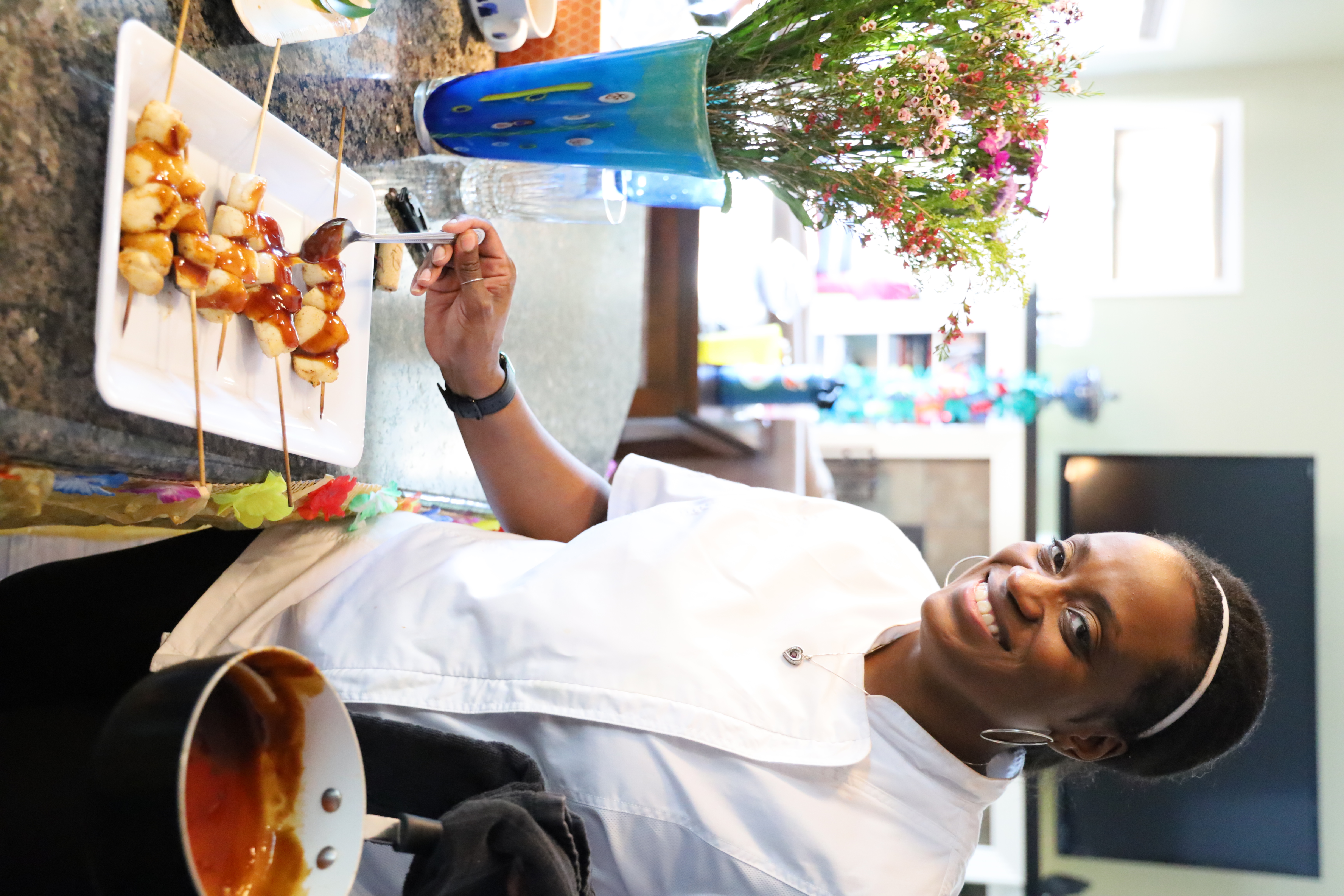 Chef Sabrina finishing a skewer service