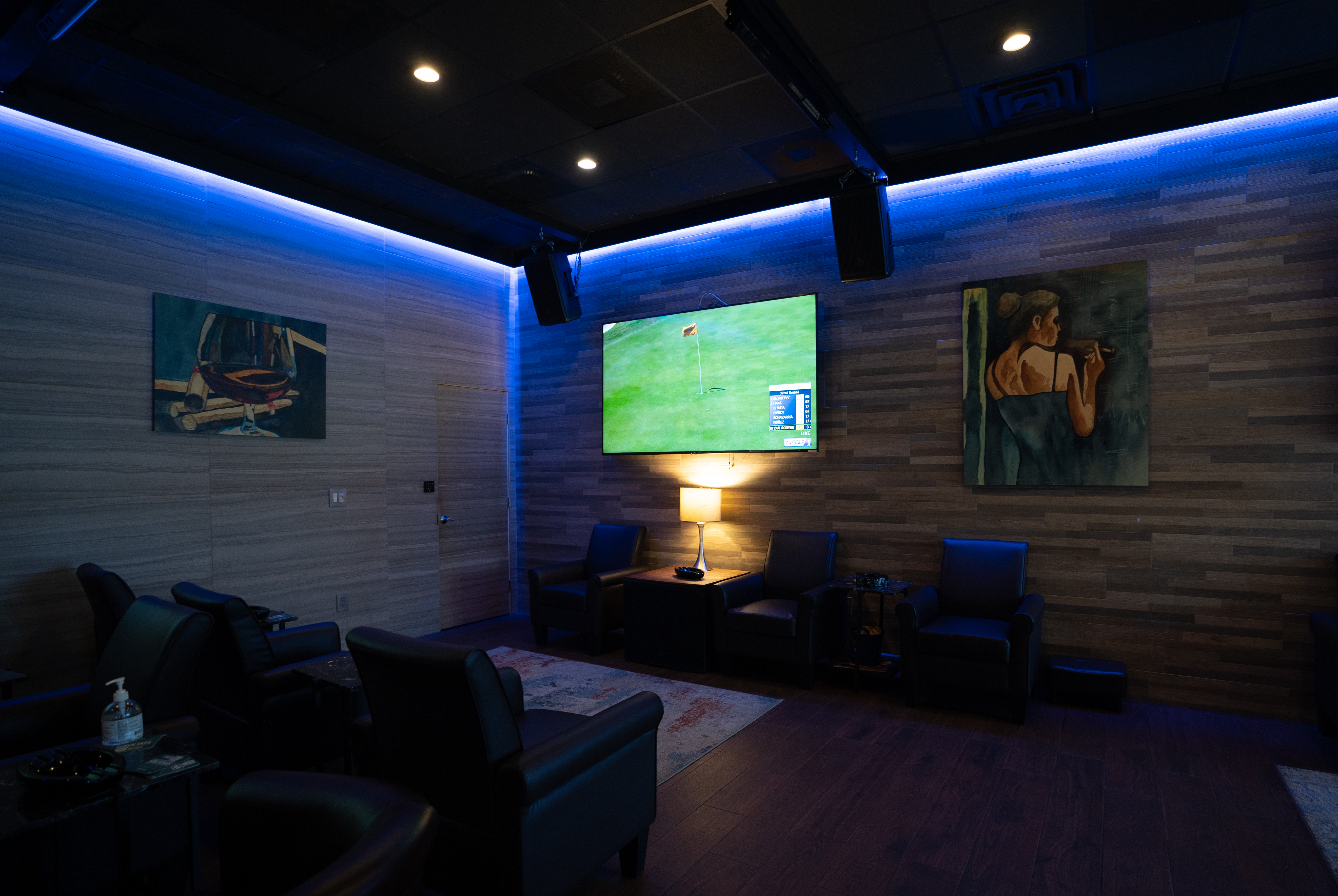 Custom home theater with calibrated 4K projection and Dolby Atmos sound in Naples FL