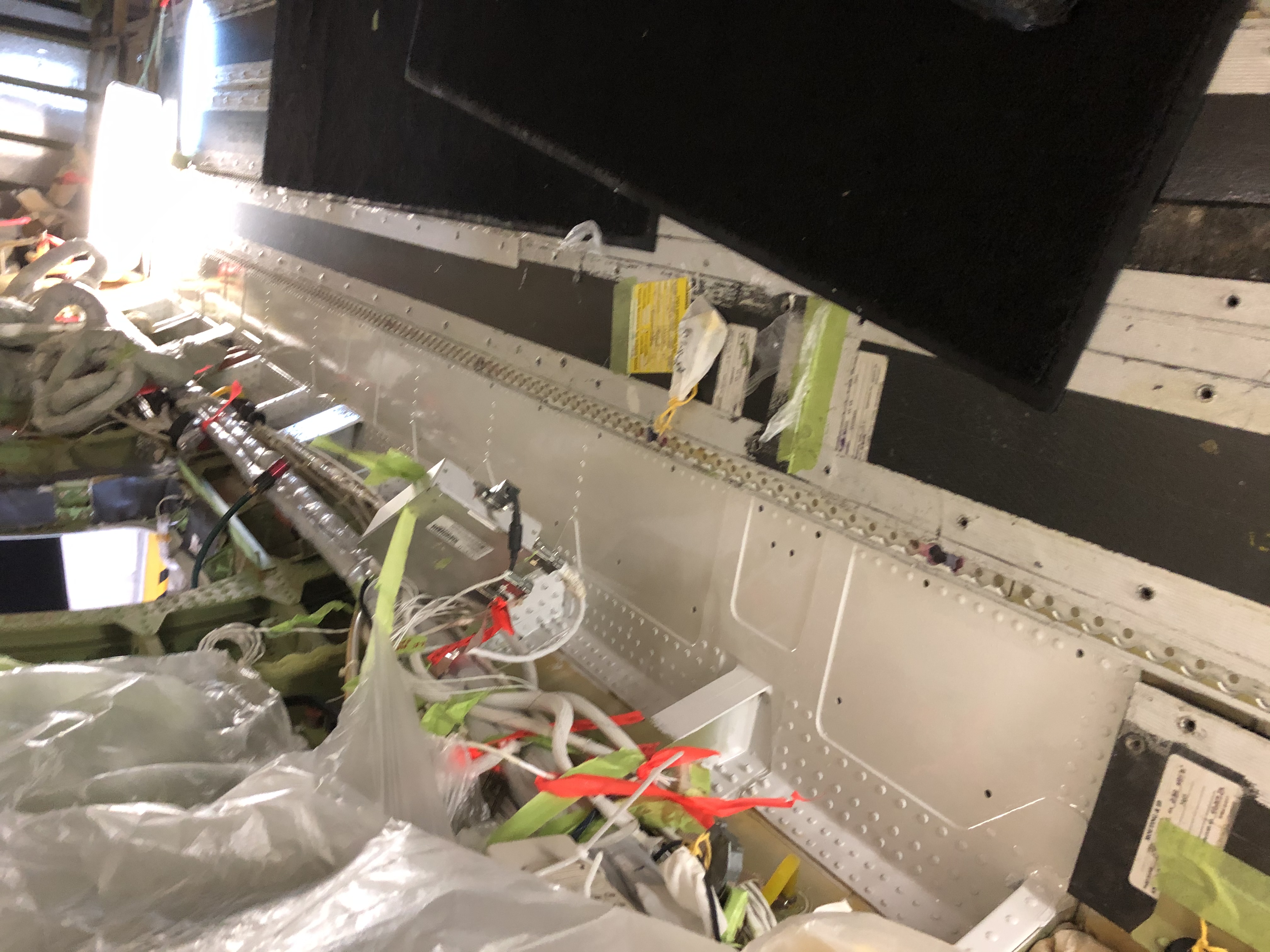 Experienced Aircraft Maintenance Engineers conducting emergency aircraft repair.