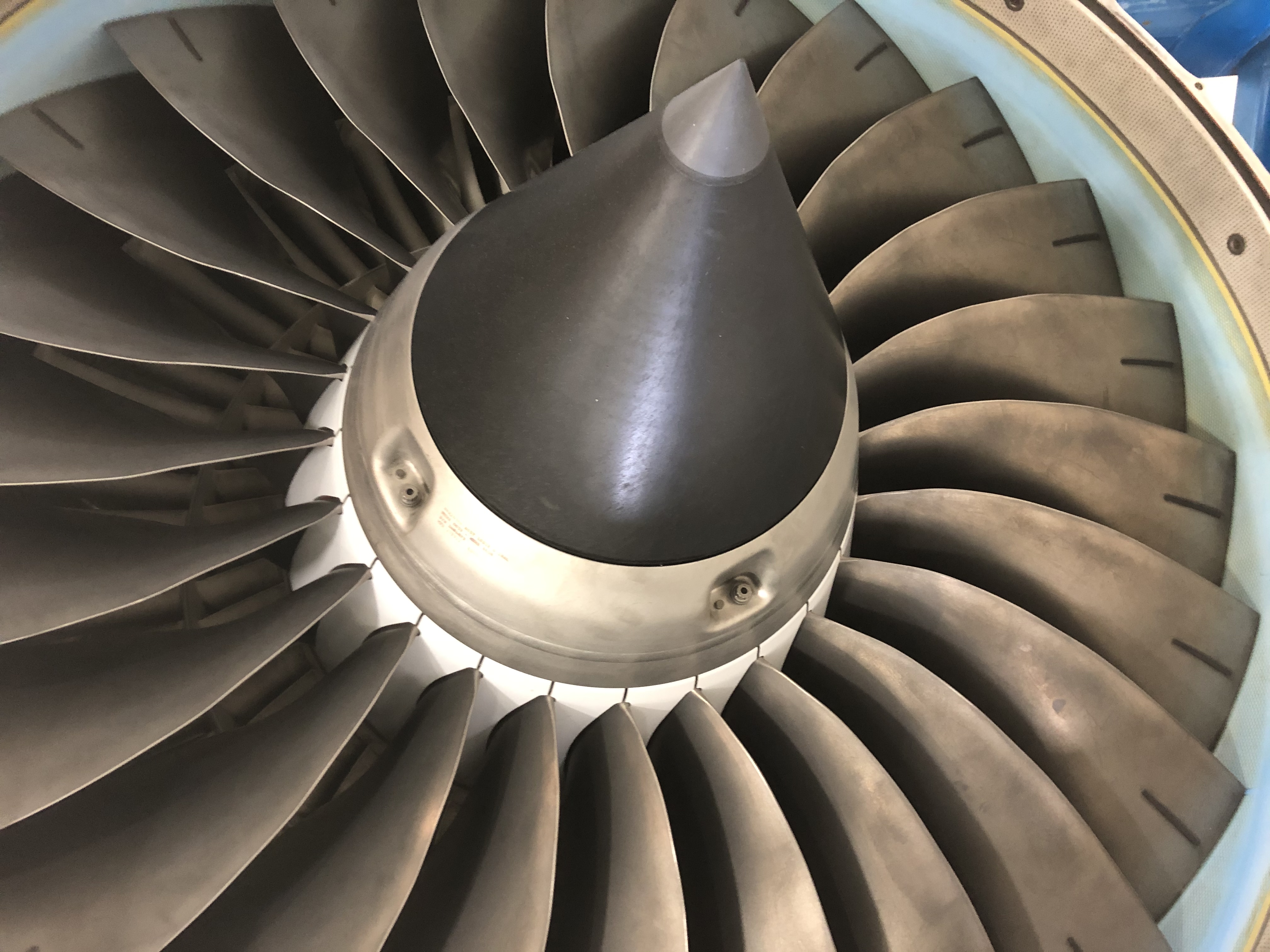 Engineers working on aircraft fuselage repairs.