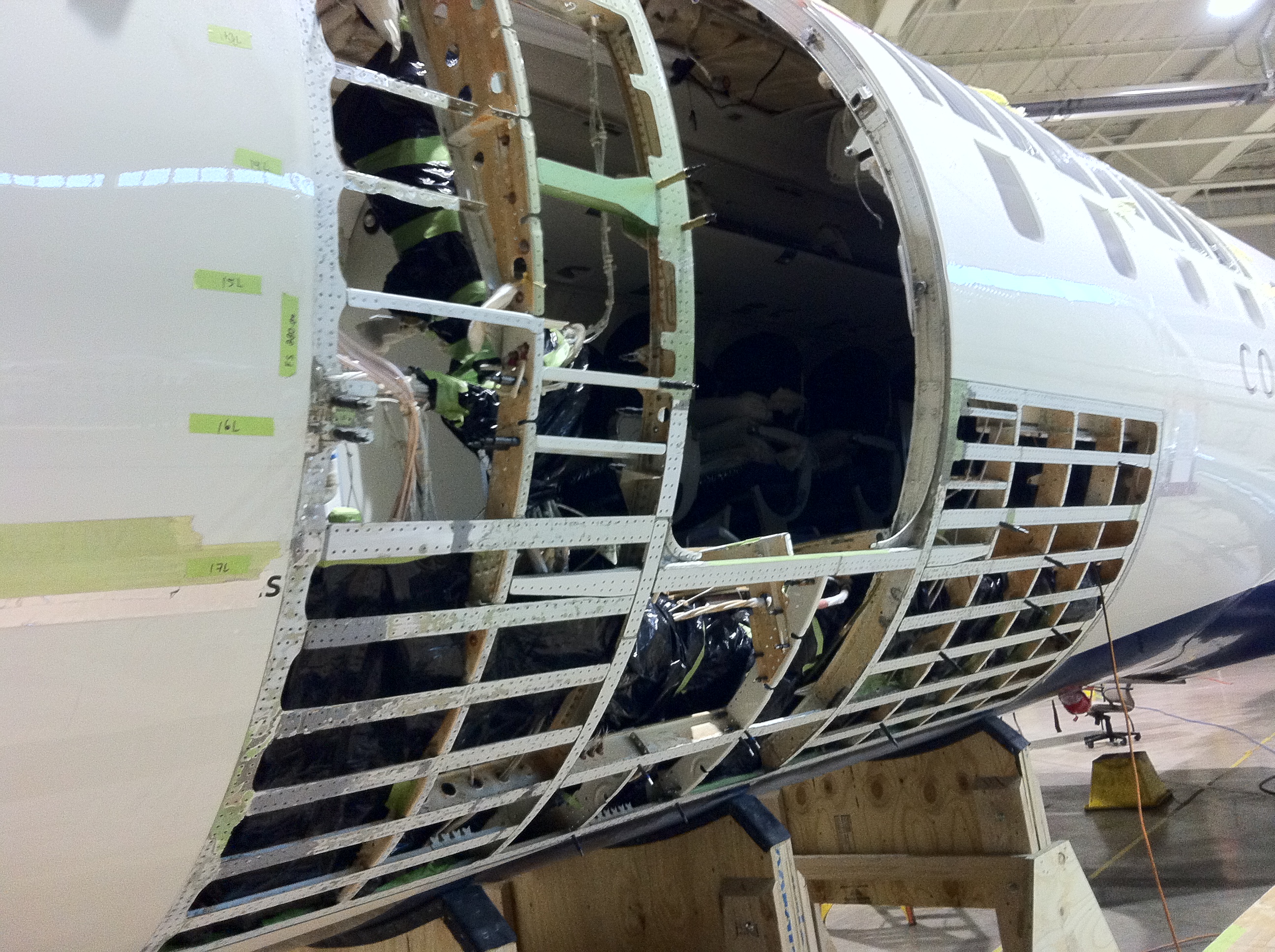 Drilling and riveting aircraft structure components.