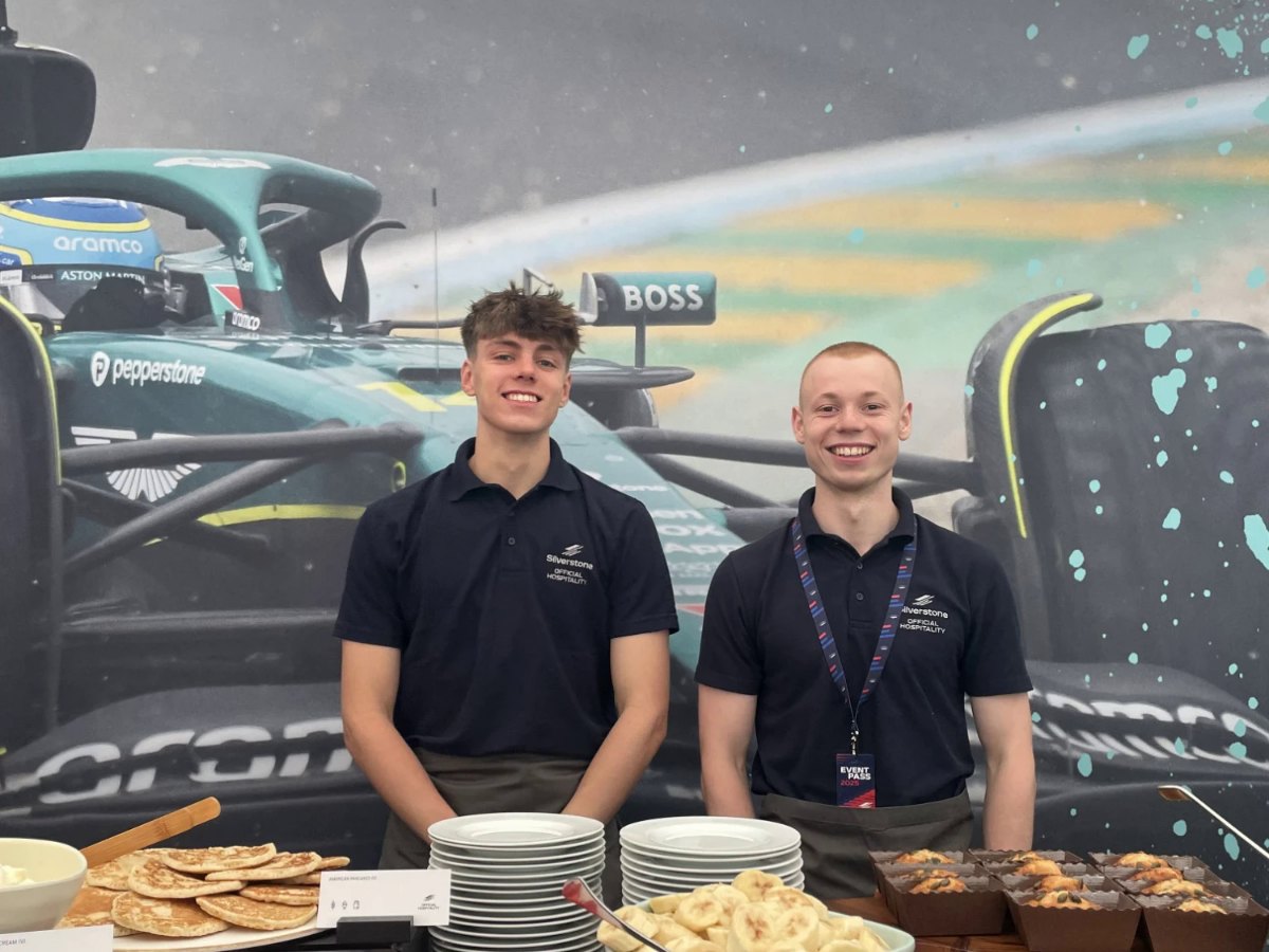 Hospitality team serving guests at a race day event
