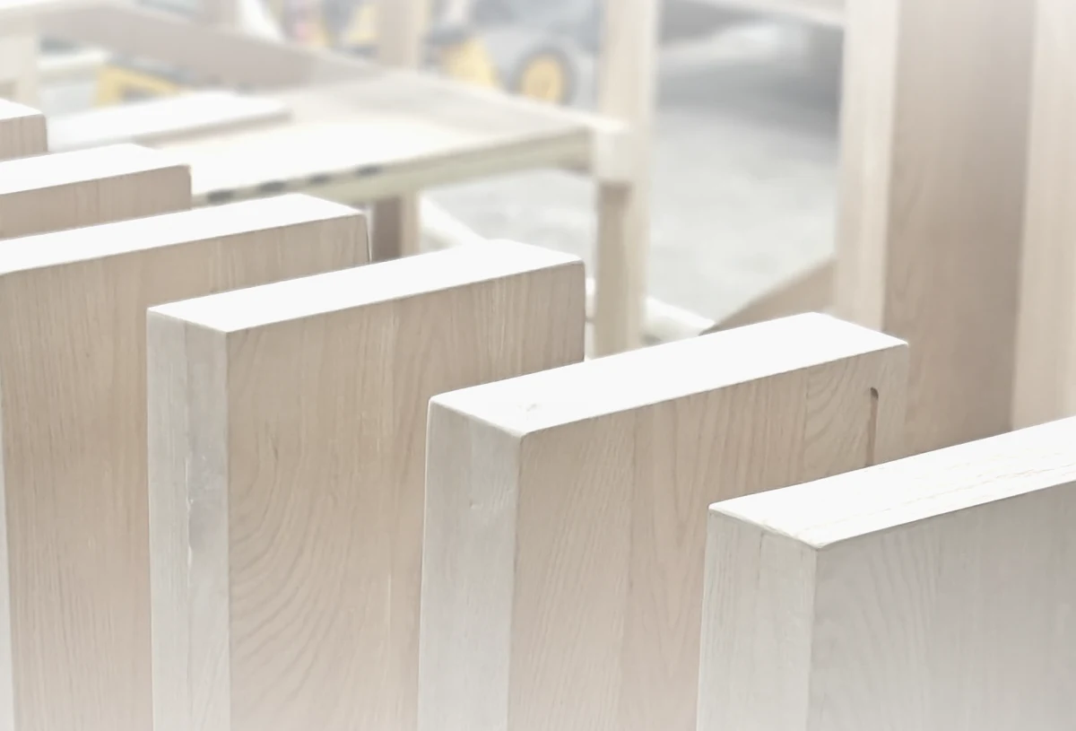 Custom white oak floating stair treads installed in a bright modern South Florida home