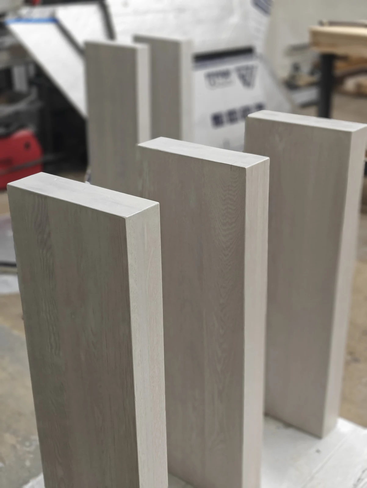 Close-up detail of precision milled white oak tread edge showing 1/8 inch nosing profile