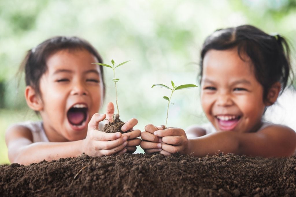 Children learning and exploring through the Origins curriculum