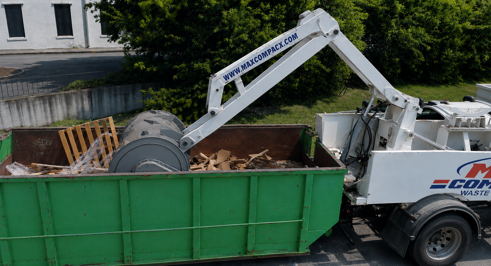 A container of loose corrugate that reads visibly full of air, before compaction
