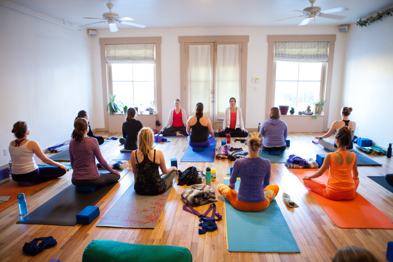 Yoga studio with women practicing